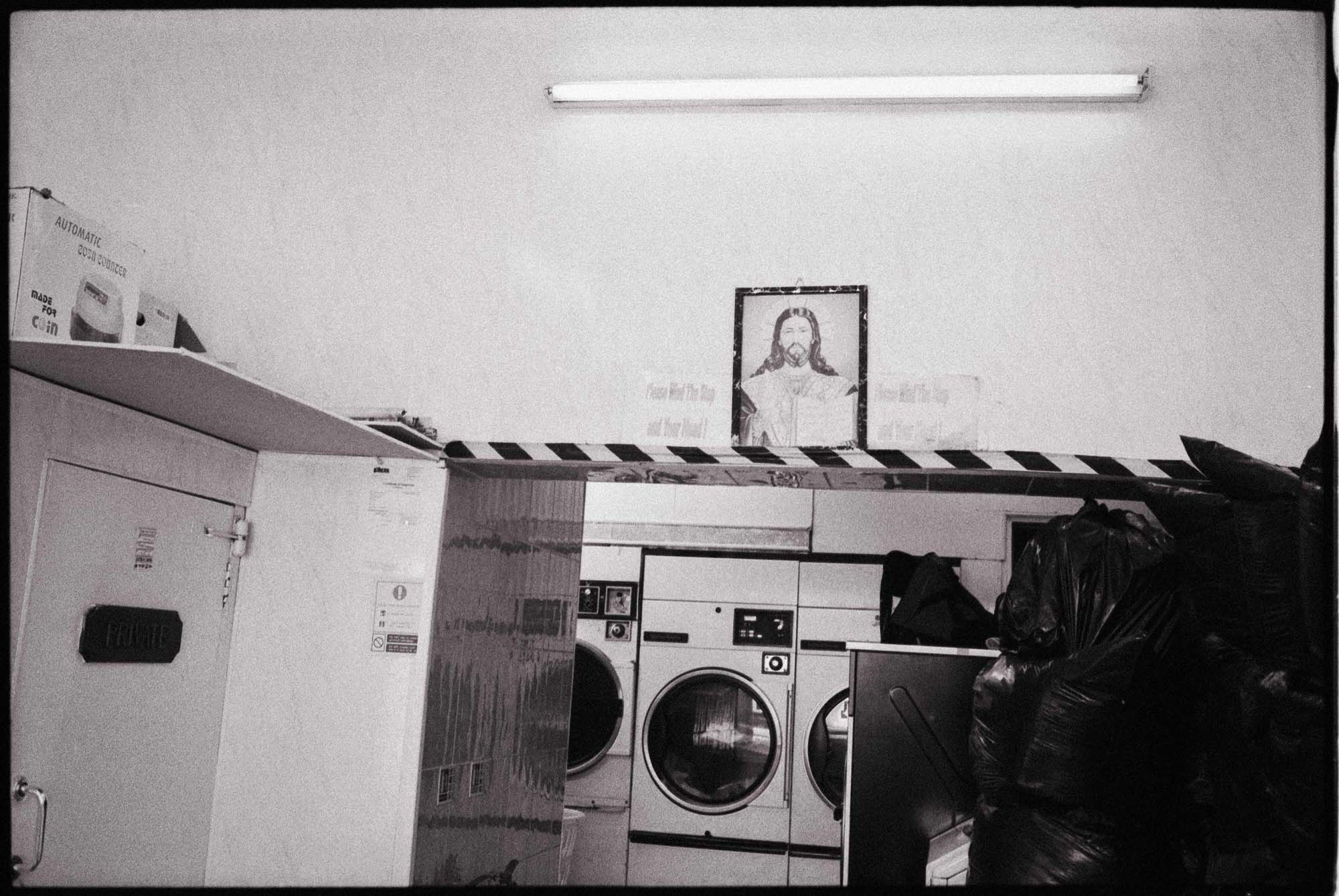 Launderette Jesus photo black-and-white