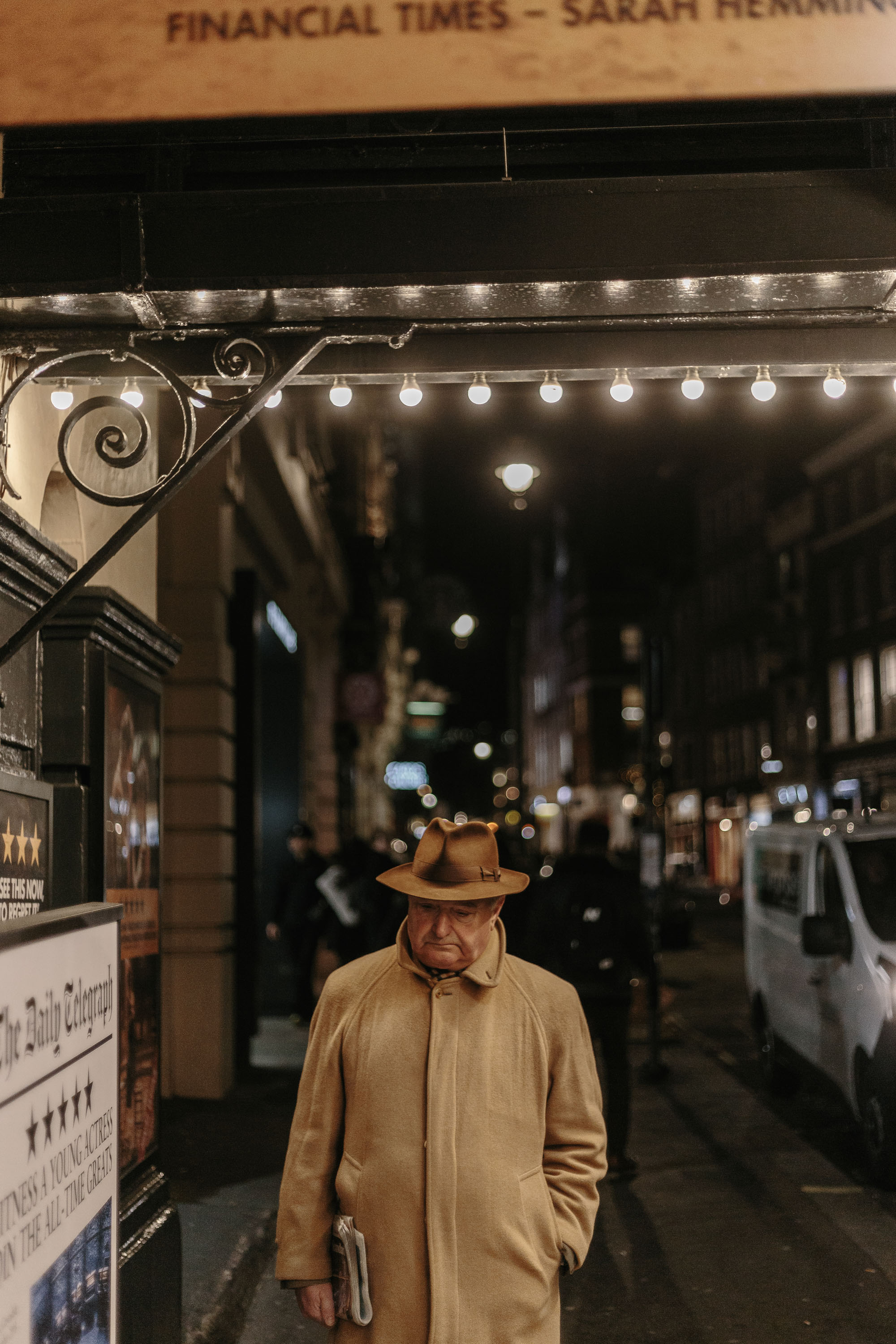 older man leaving theatre