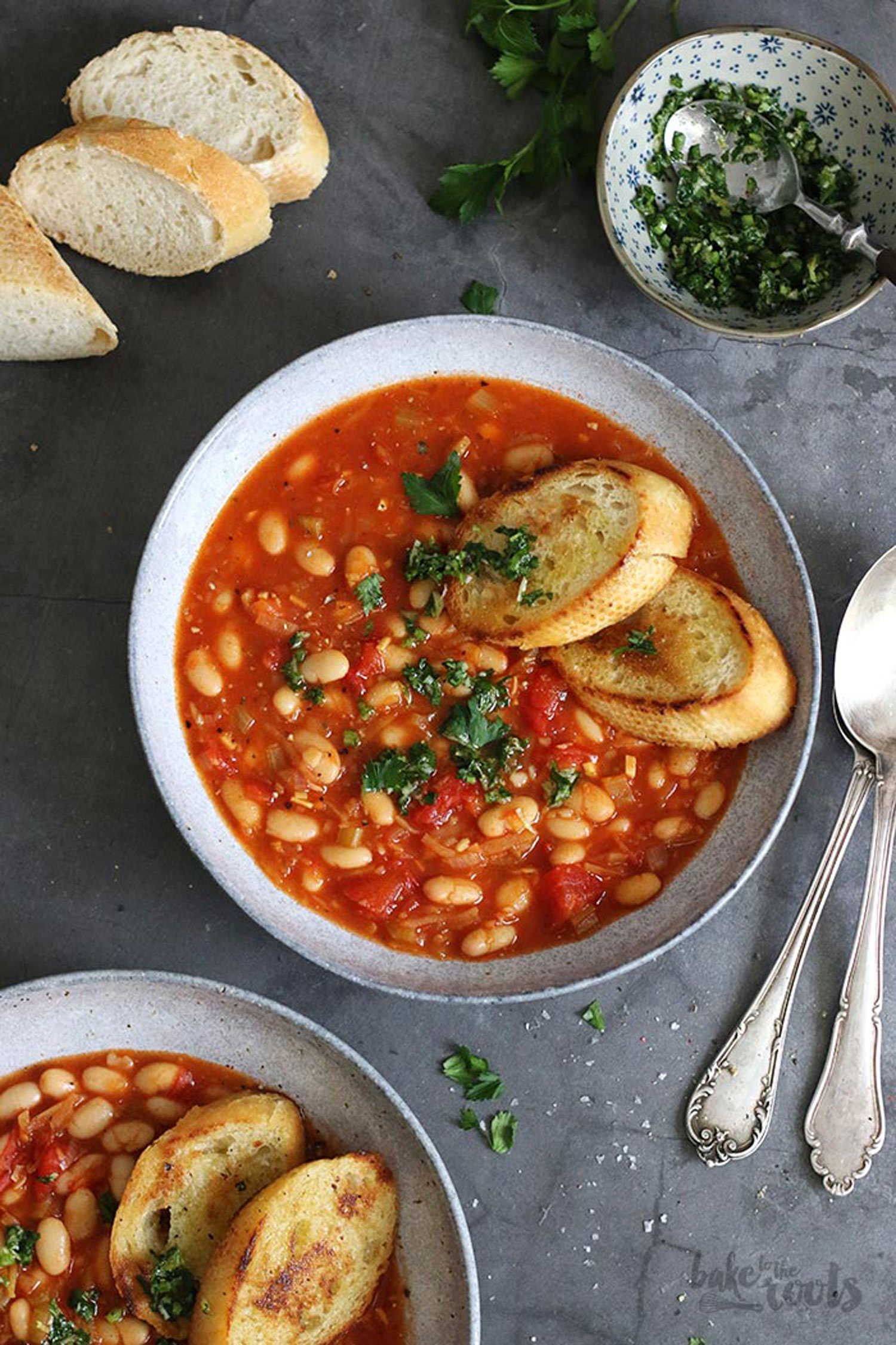 Beans and toasted bread in a bowl