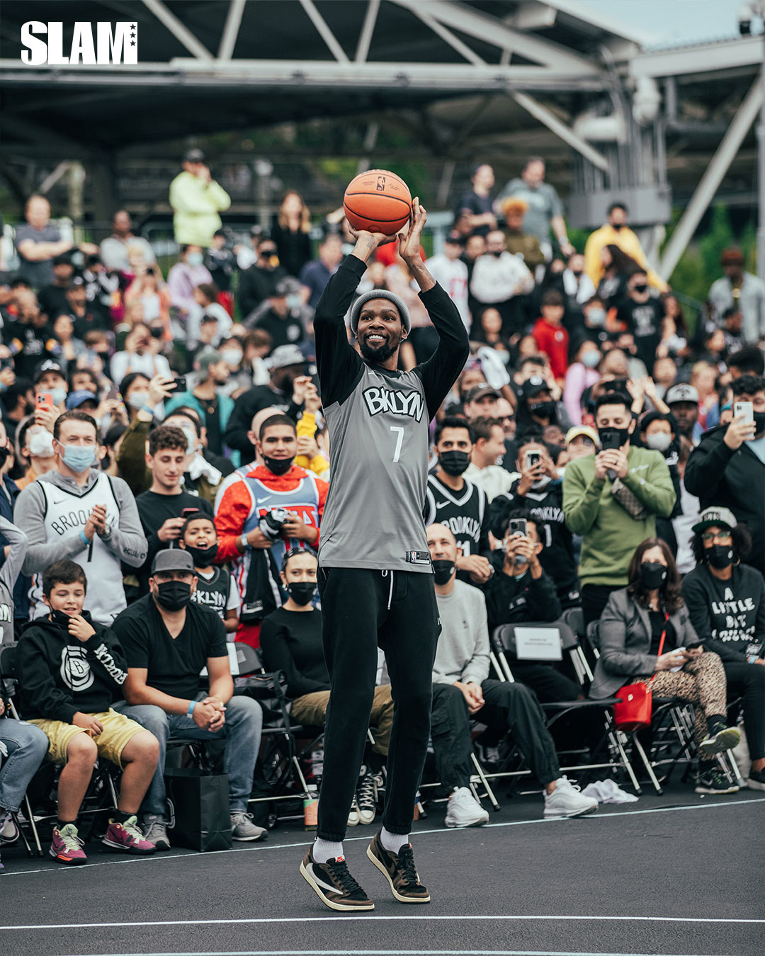 Basketball player taking a shot at the hoop