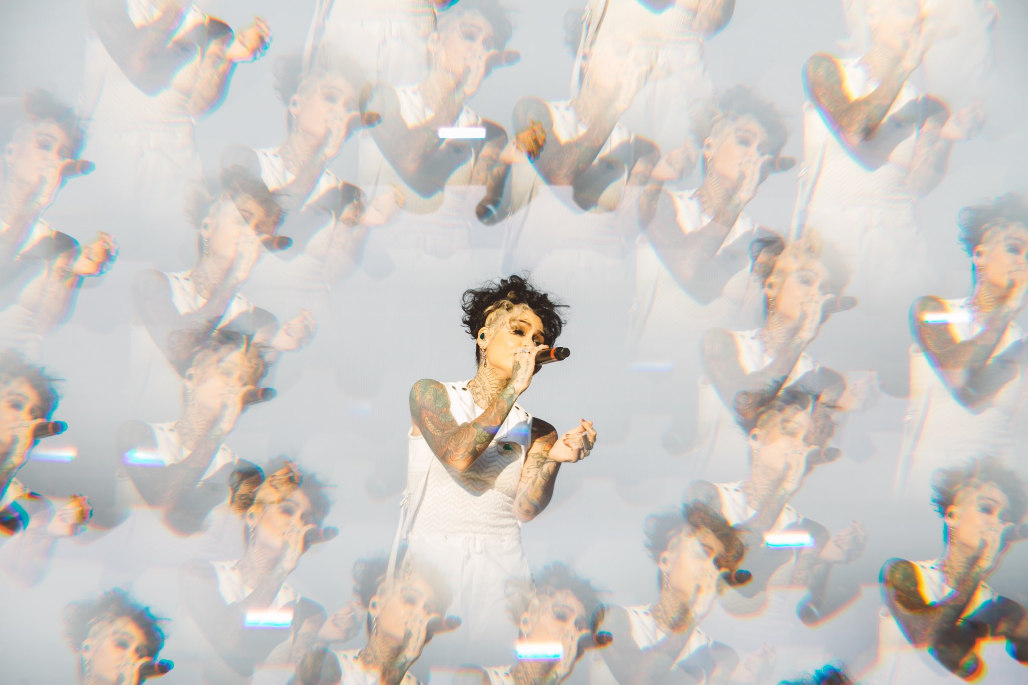 Singer performing live seen through a kaleidoscope