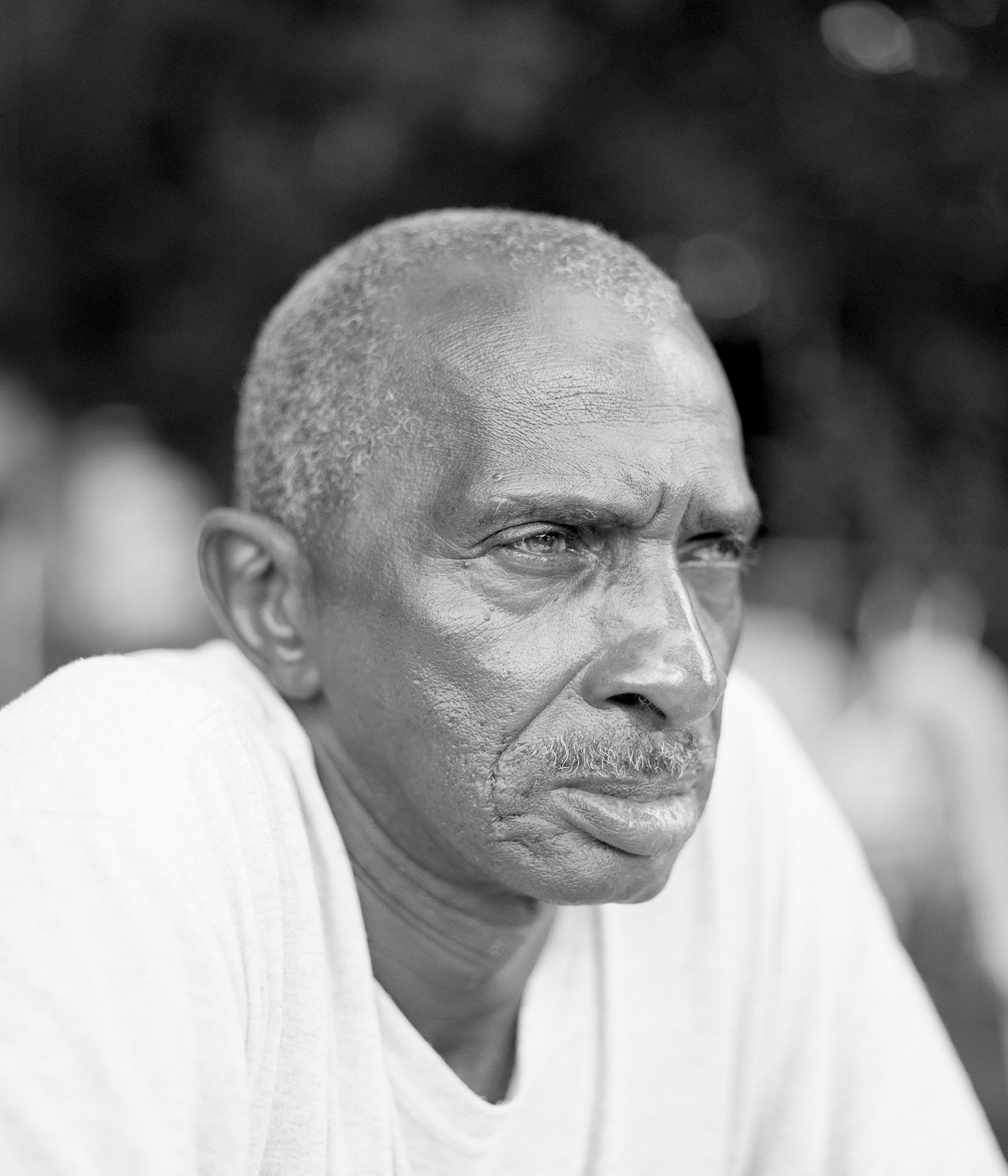 Portrait of a person in black and white side on
