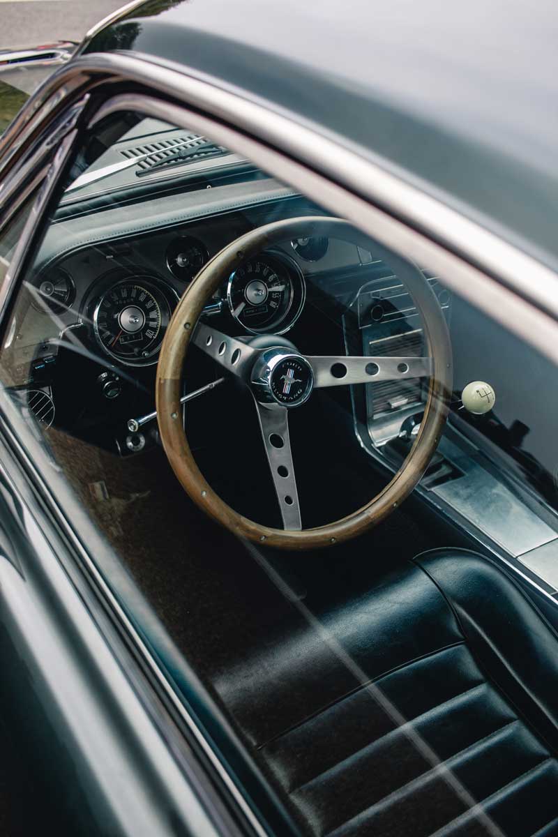 Driver's seat and wheel of the Ford Mustang Fastback
