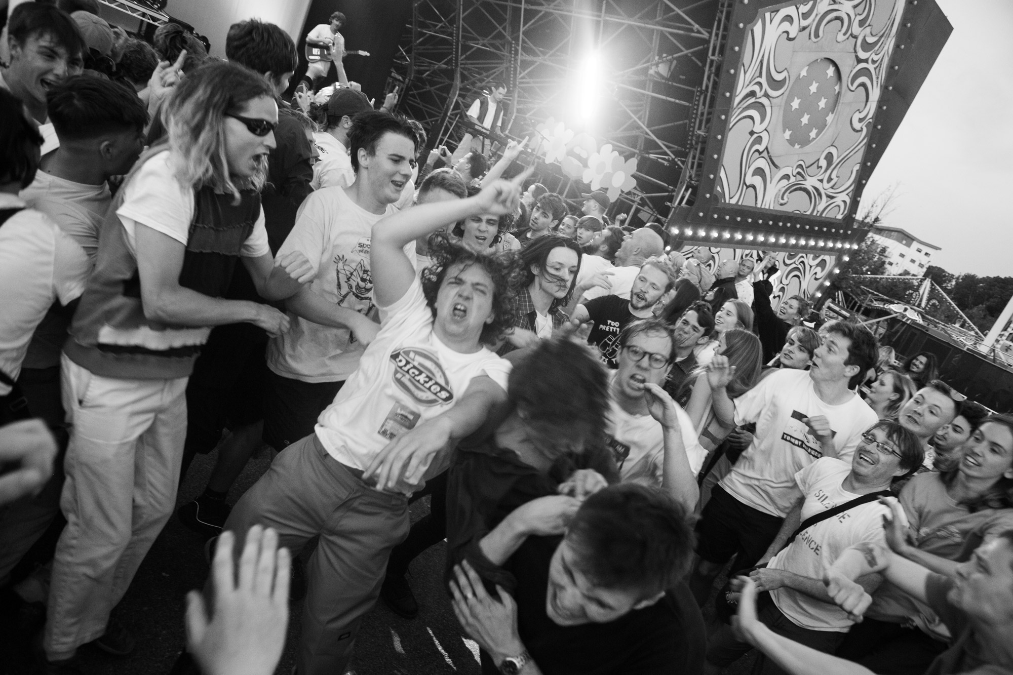 B&W photo of people dancing at a festival