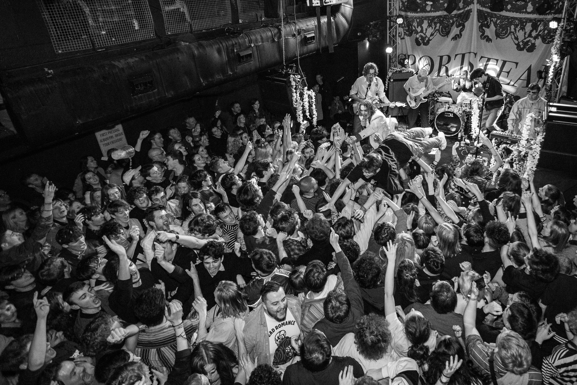 People dancing at a gig - B&W