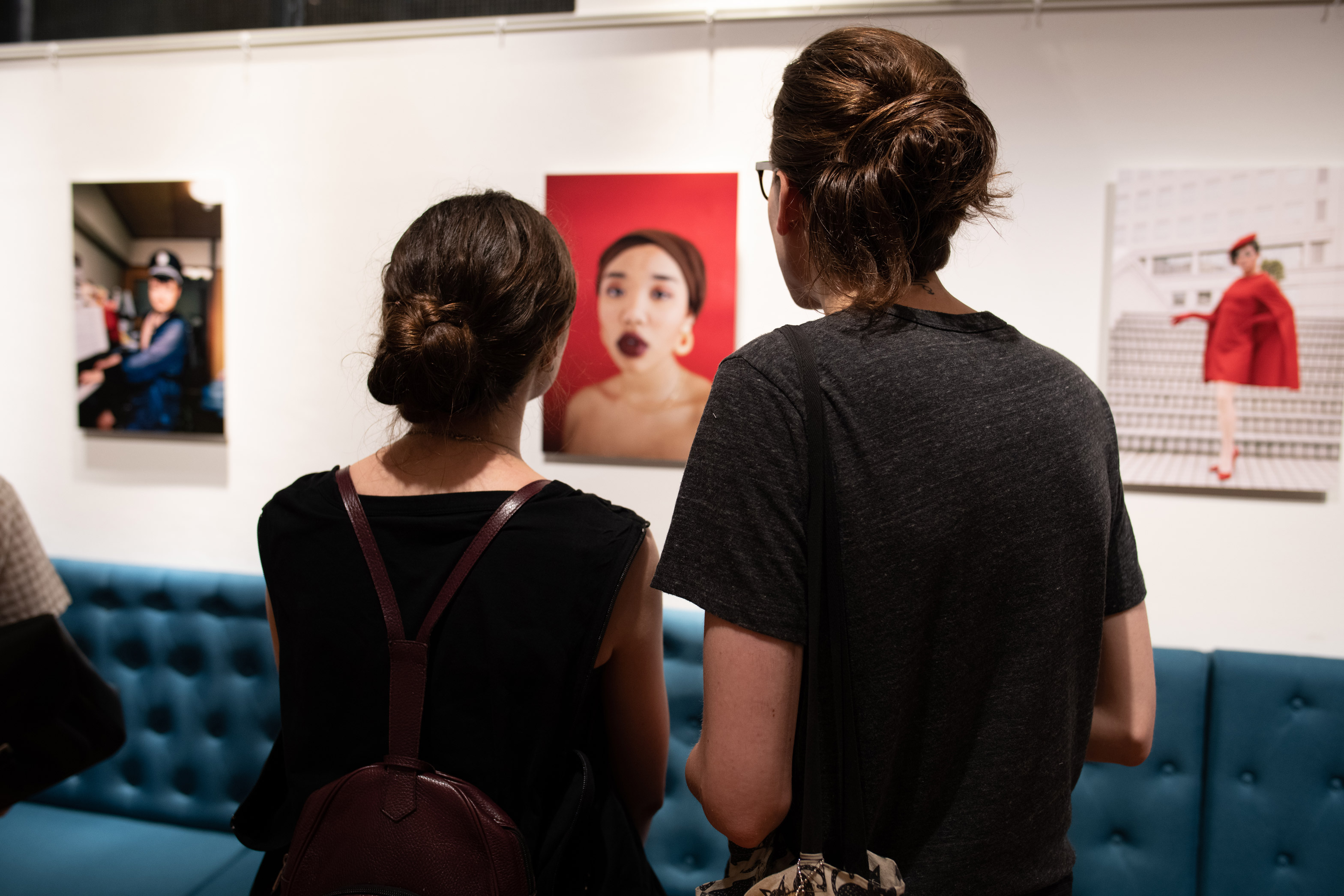 Two people looking at an image
