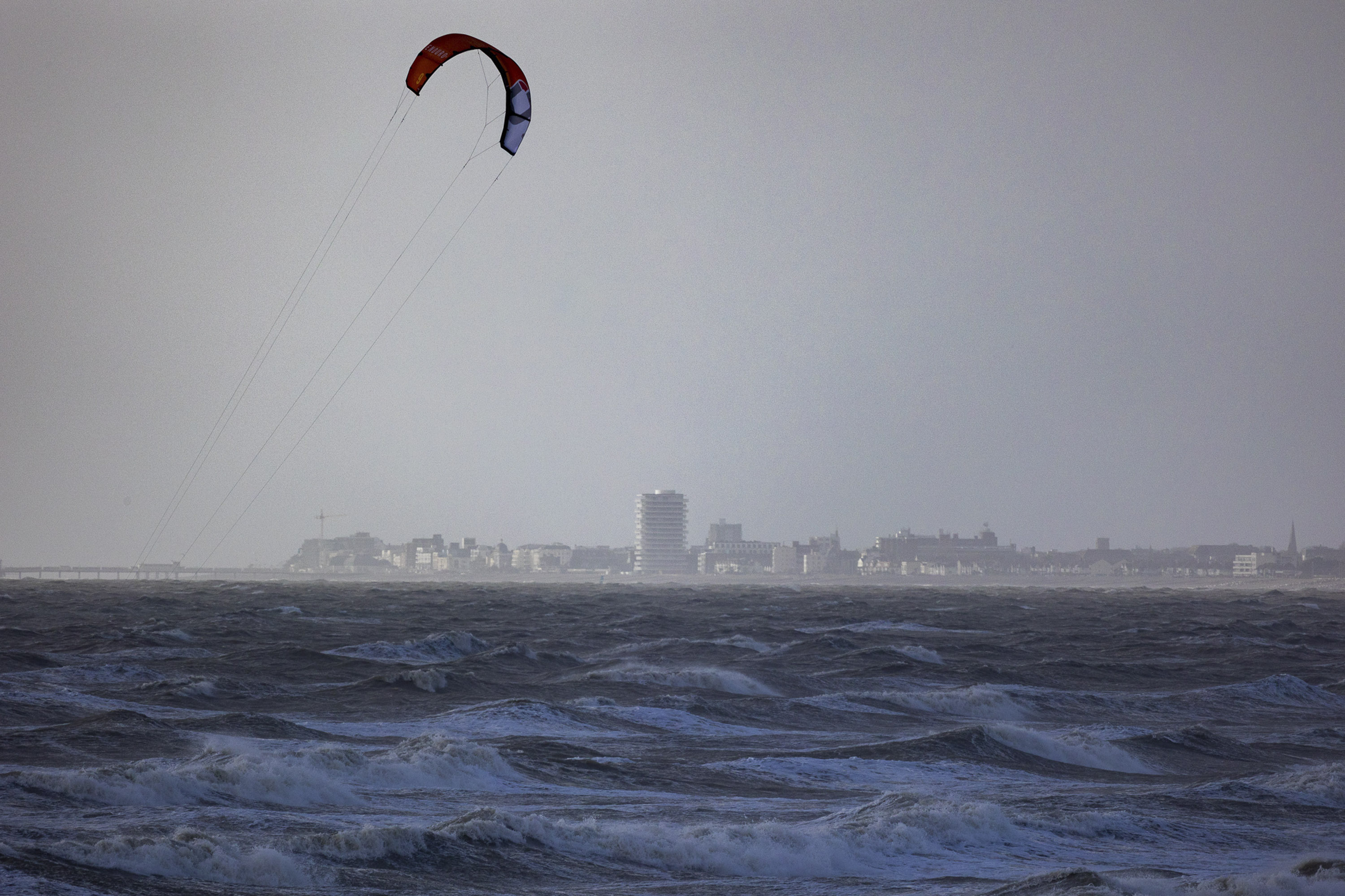 Windsurfer surfing out at sea at Brighton Beach 