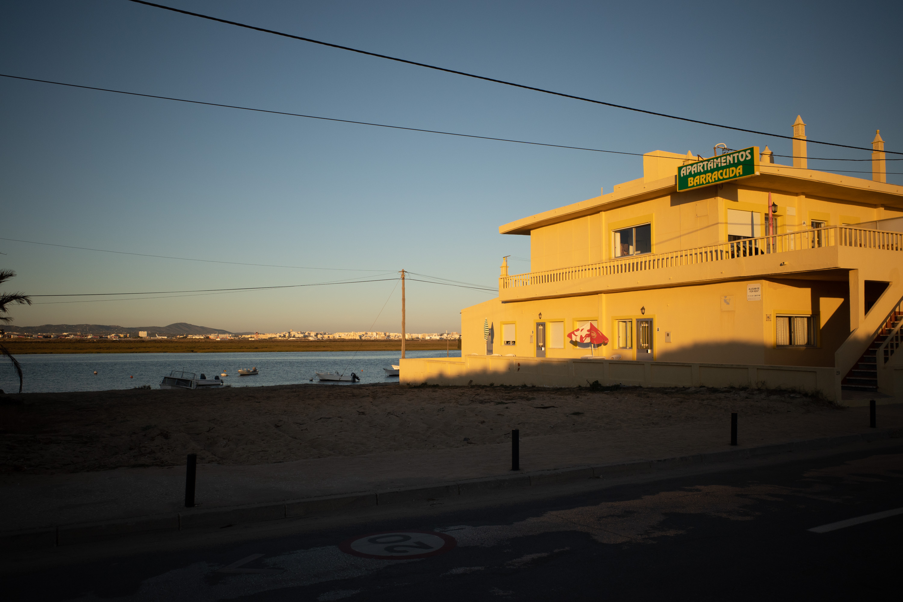 Sunset image of the the Apartamentos Barracuda hotel in Faro, Portugal
