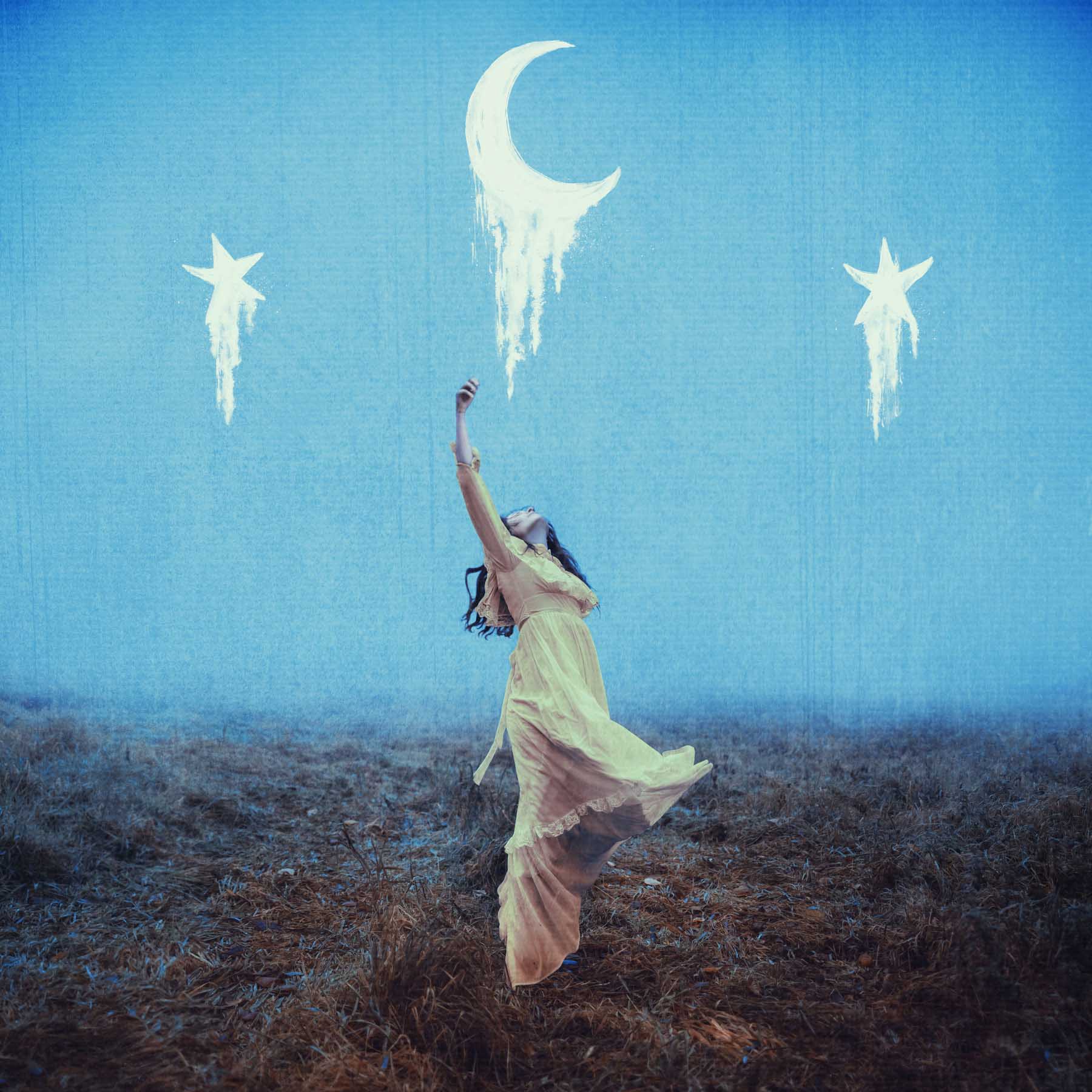 Mixed-media of a woman in a heath wearing a pale yellow dress jumps up to catch a painted moon surrounded by painted stars