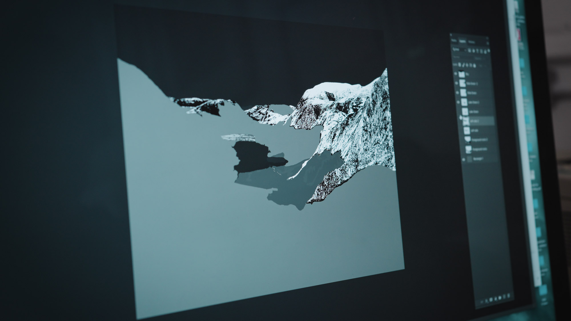 Computer screen with landscape image on it