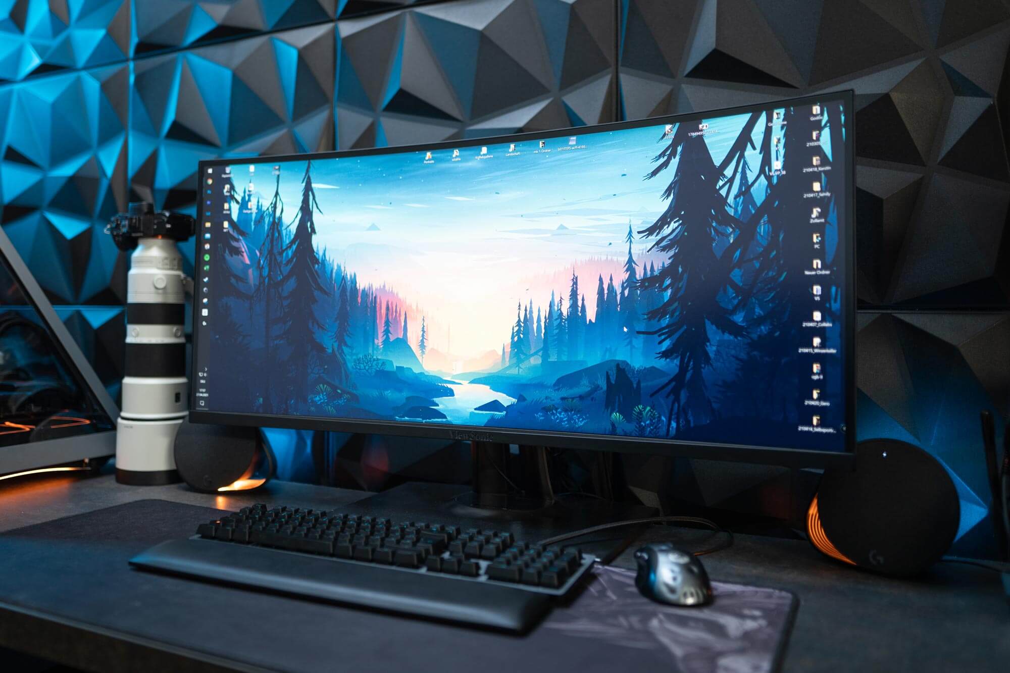 A ViewSonic VP3881 computer monitor with a keyboard, a mouse and a lens next to it