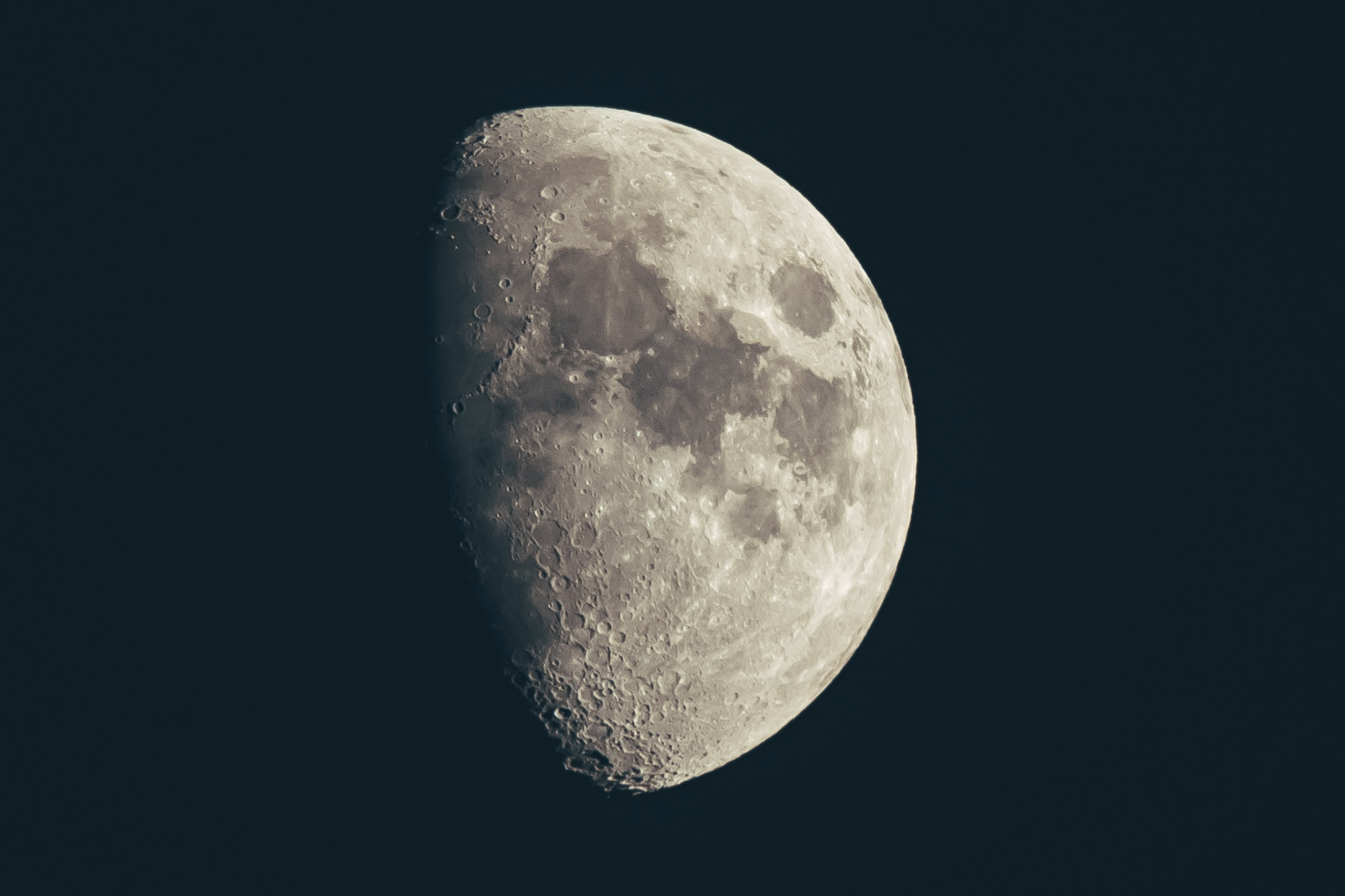 the moon, partially illuminated