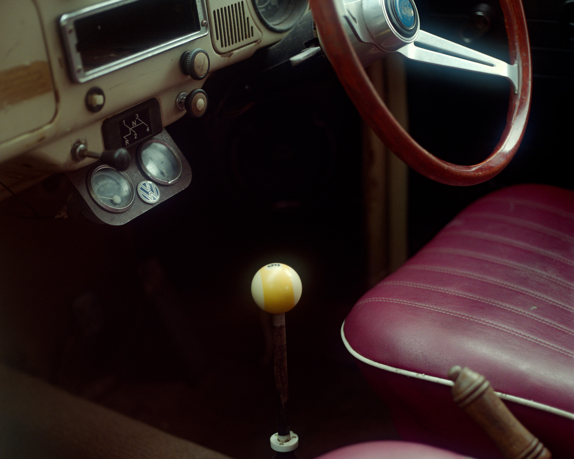 Polarised image of an old-school car through a car window