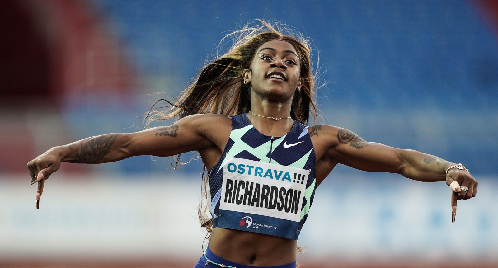 Photo of an athlete celebrating after winning a race