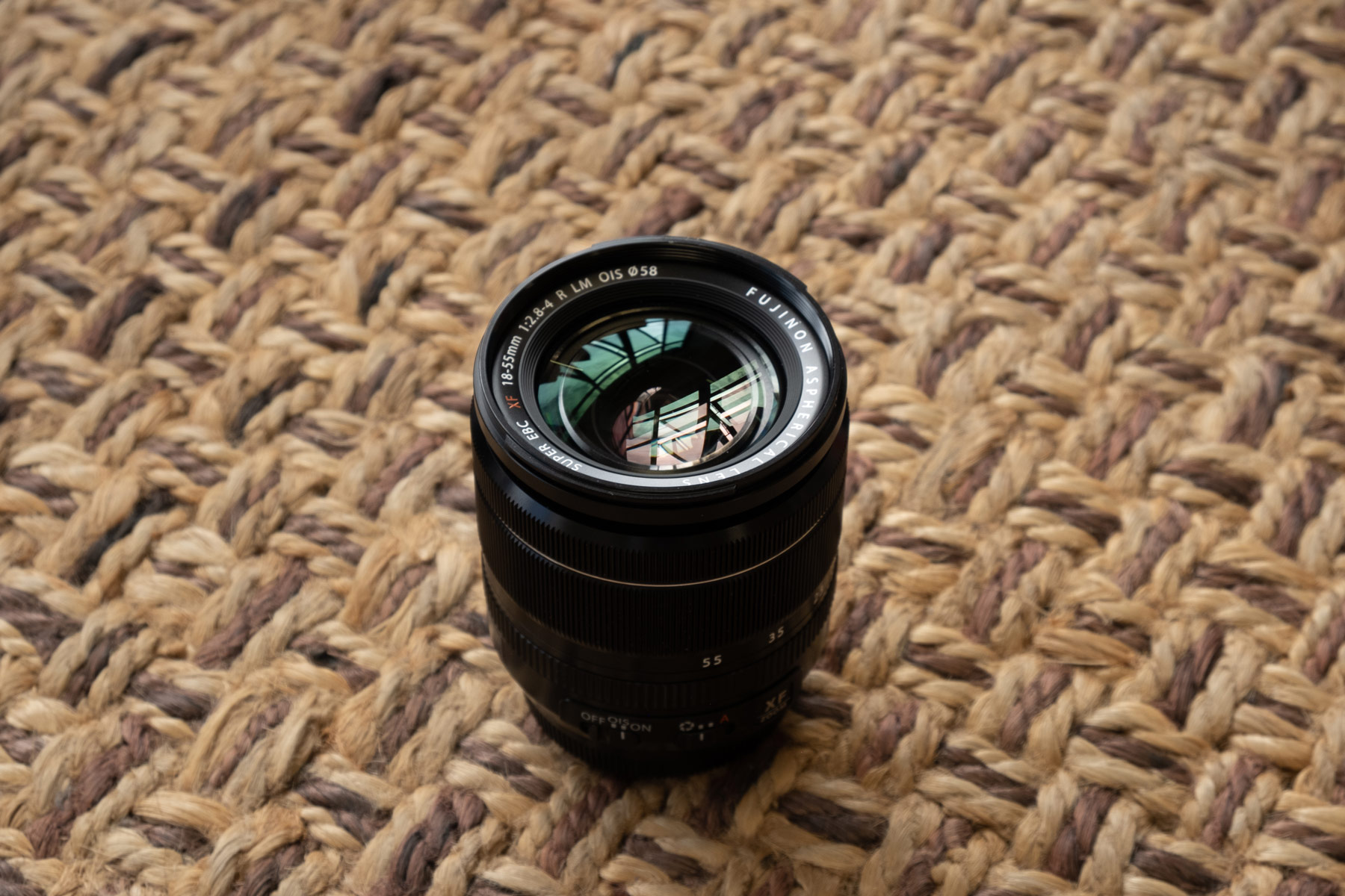 Fujifilm XF 23mm f/1.4 R on beige rug background