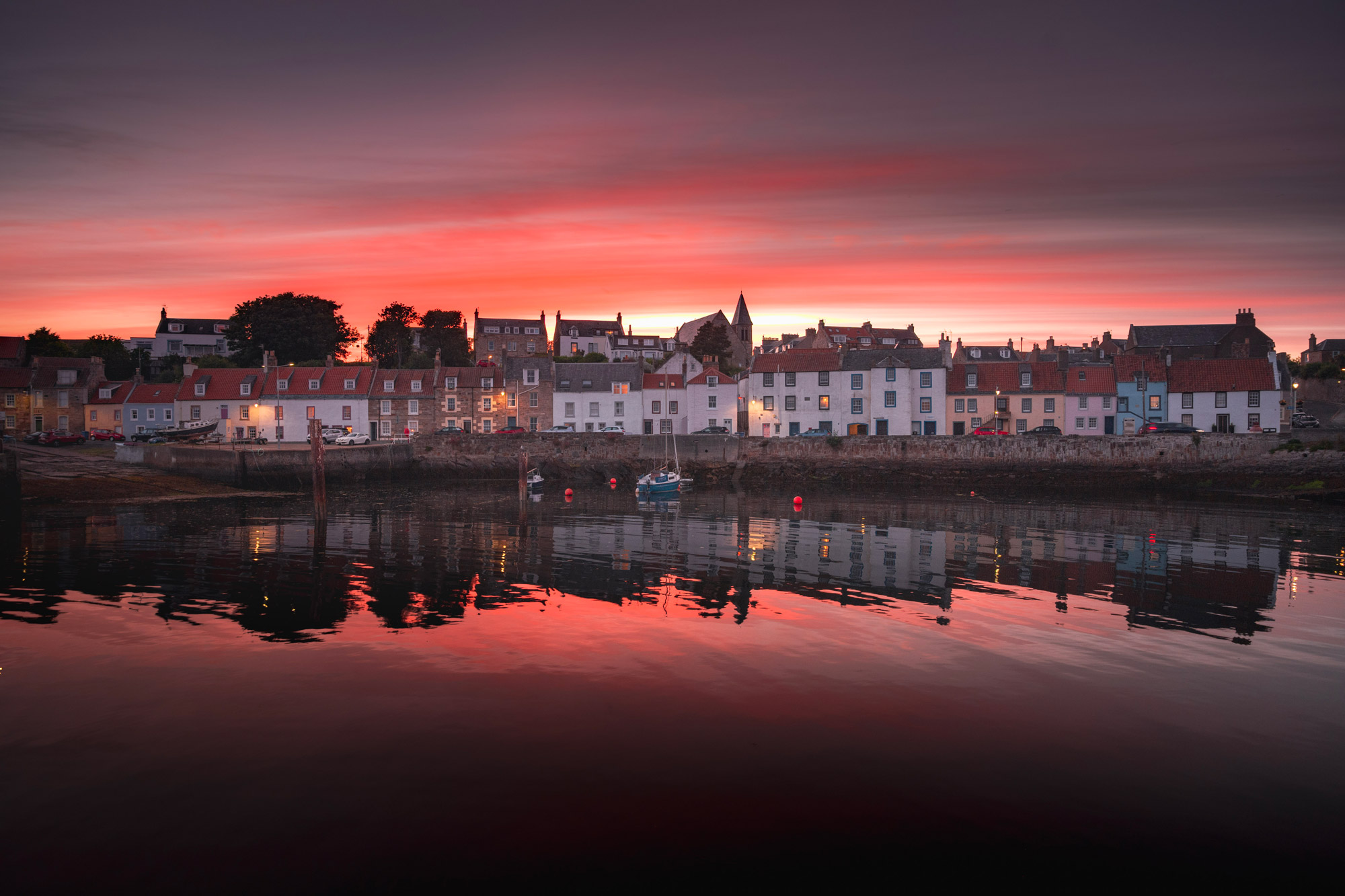 Houses on a riverbank during sunset, shot with the Nikon Z7
