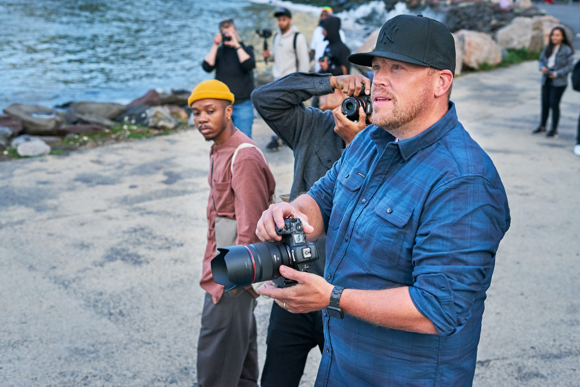Group of photographers go for a photo walk on a waterfront