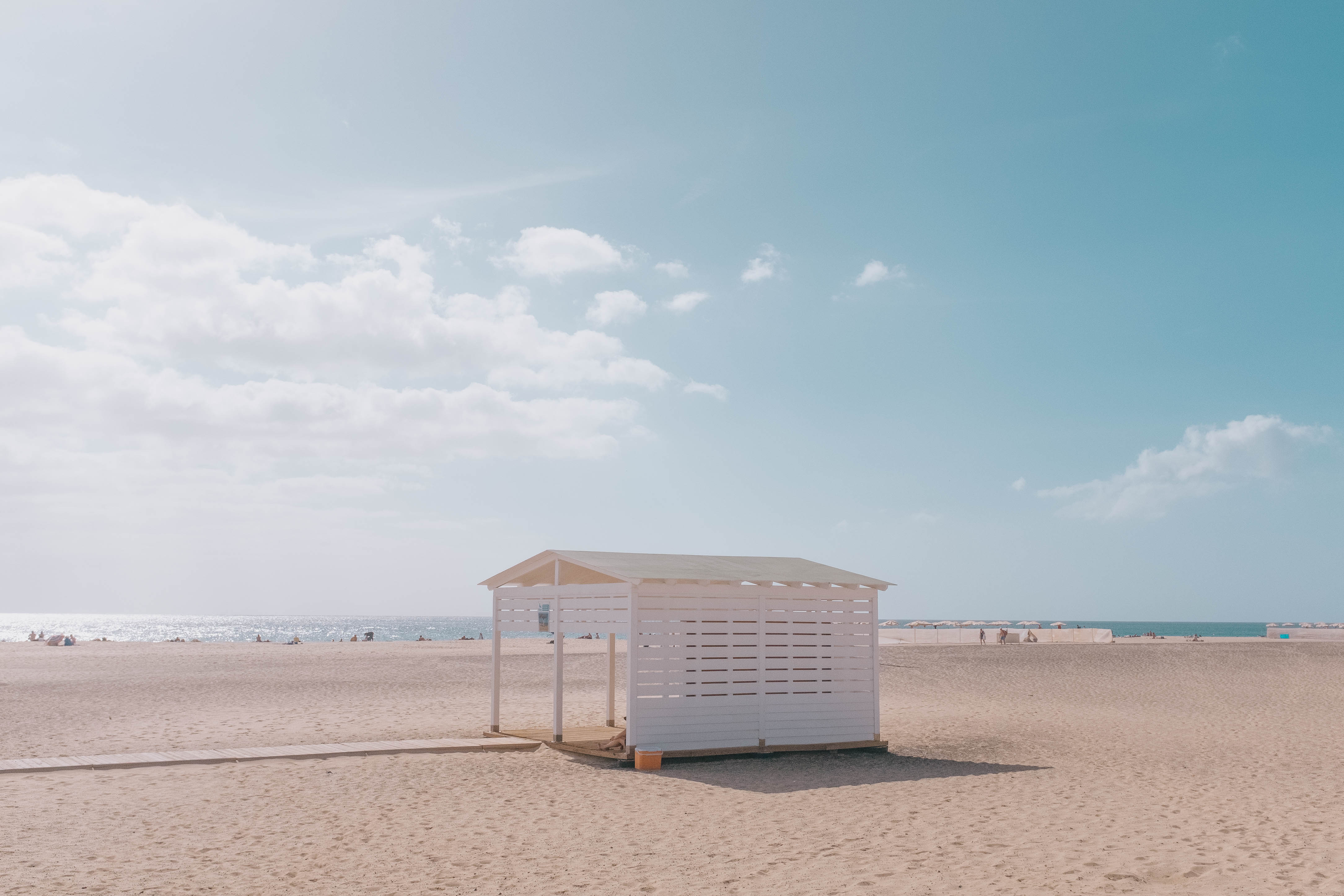 A wooden structure on a beach on a bright sunny day. Taken by Connor Redmond on the Fujifilm X100F.