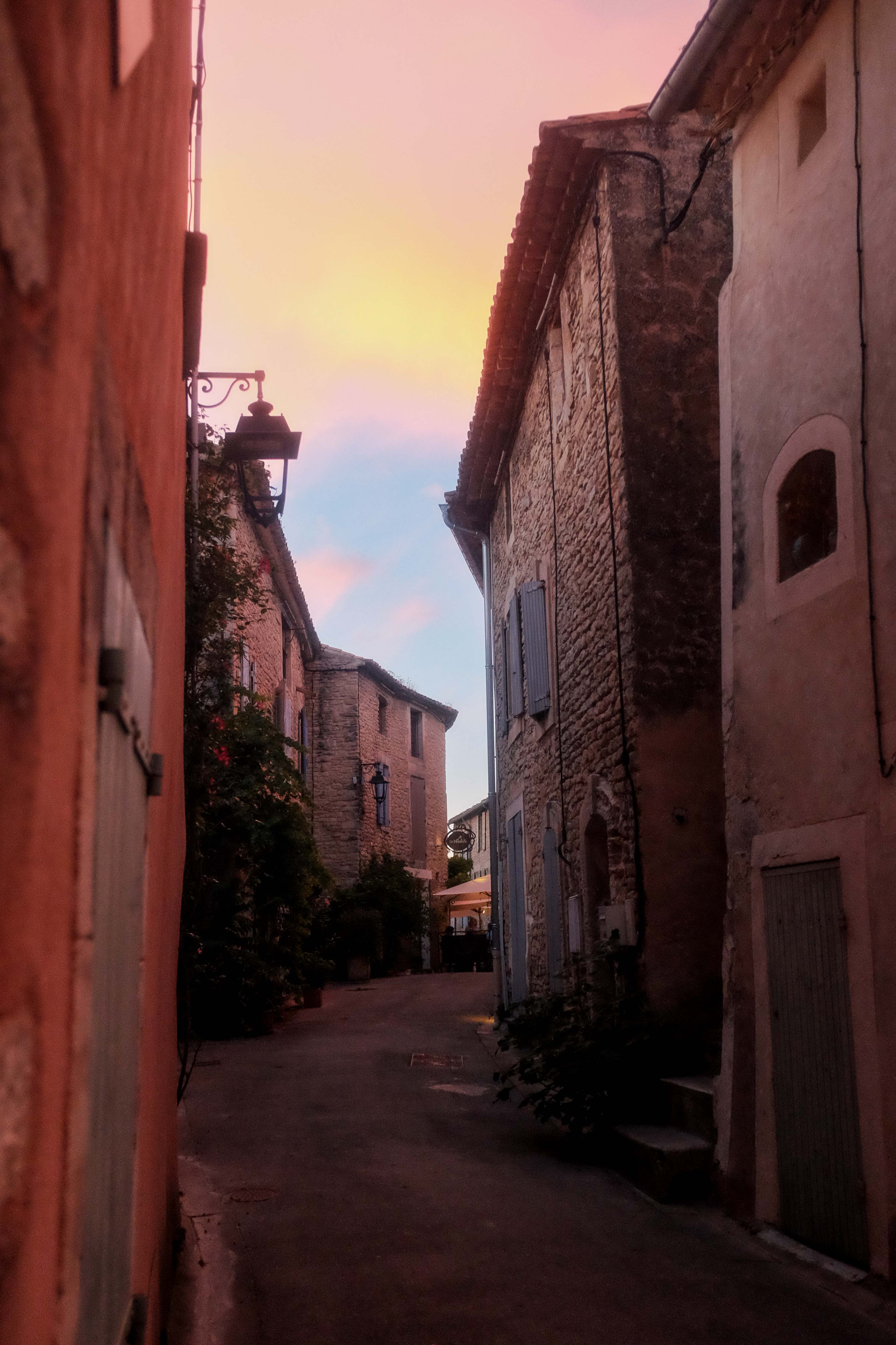 A narrow street in Gordes, France, at sunset. Taken on the Fujifilm X100T by Connor Redmond.