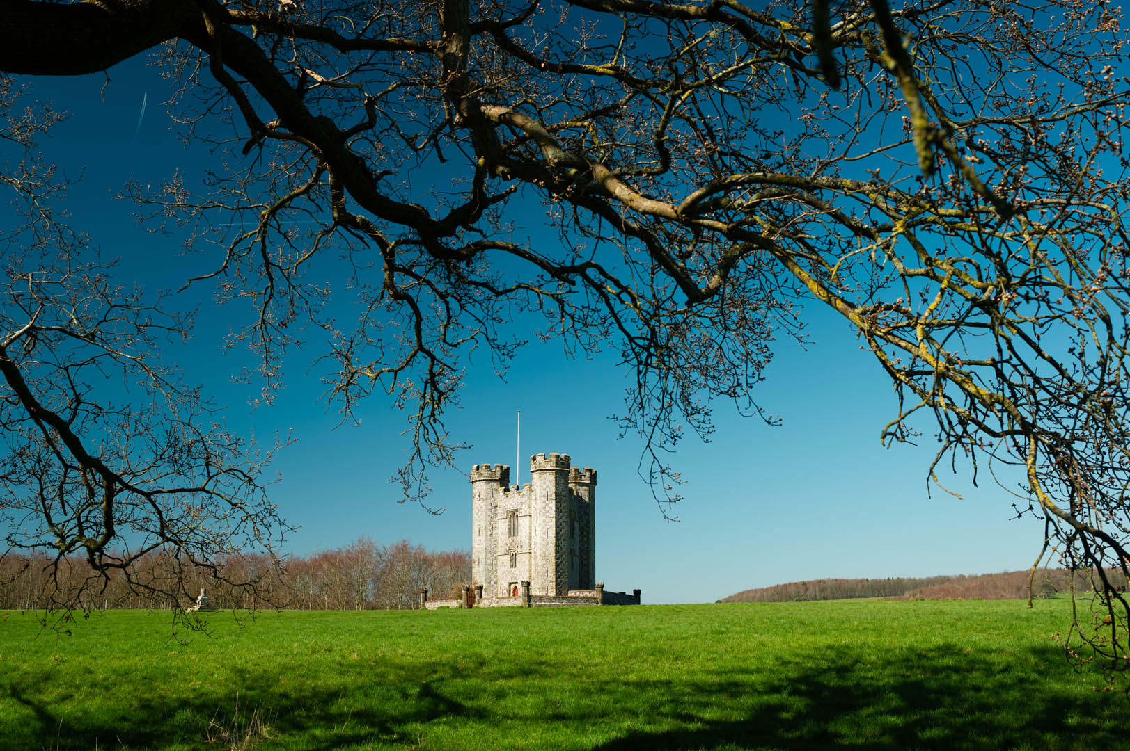 Wide angle photo of a small old castle in Sussex, England by Jakub Golis

