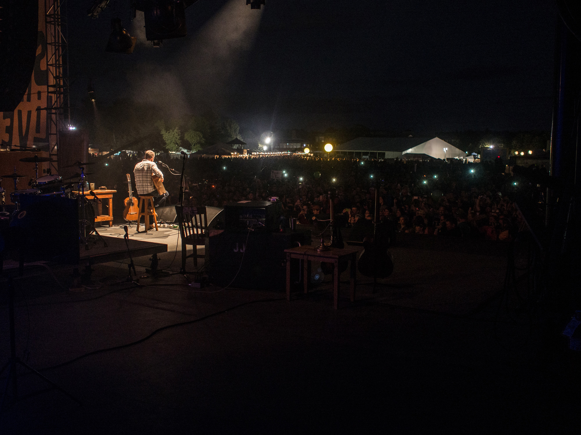 Jack Johnson on stage performing solo, photo taken by James Joiner.