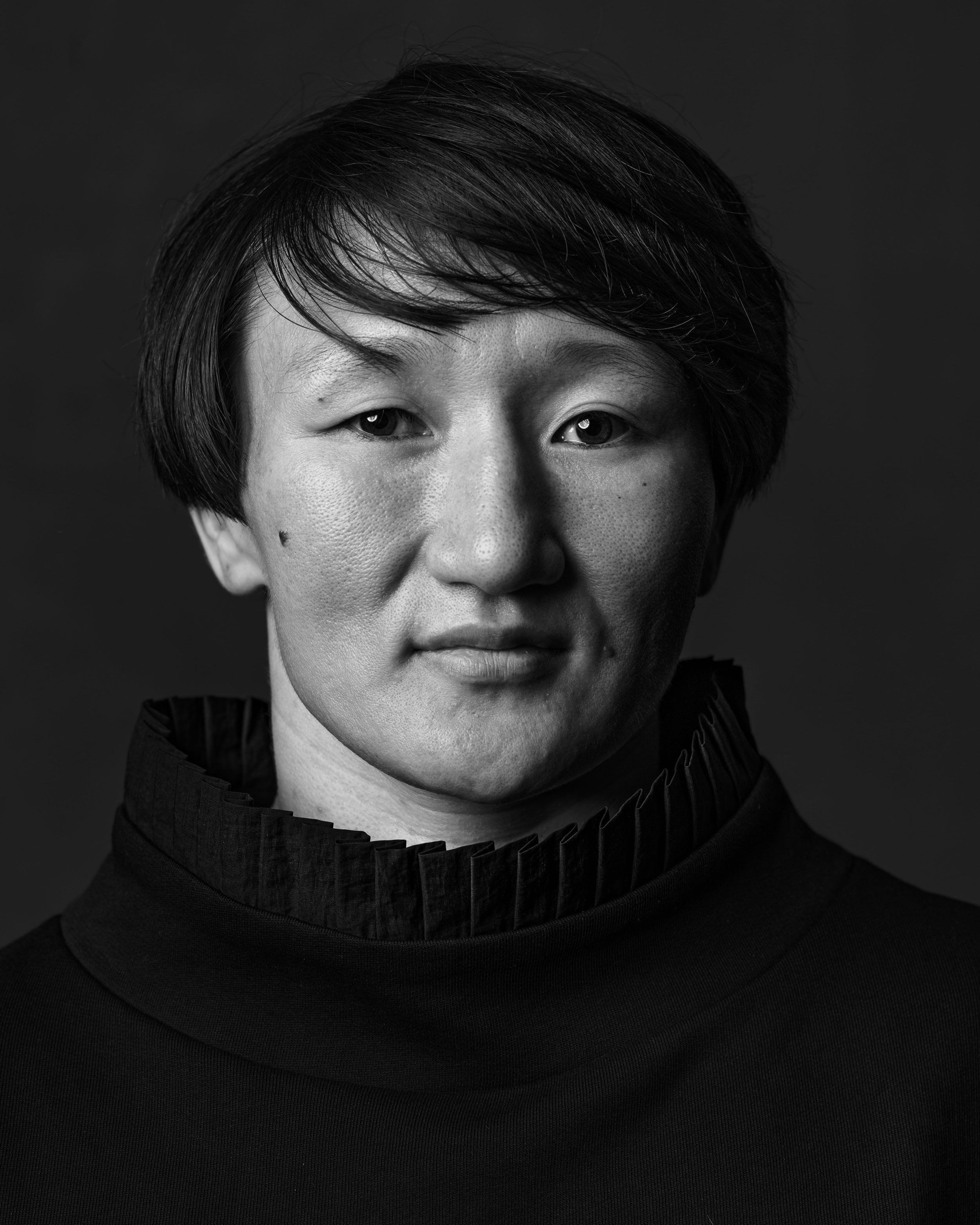 A portrait of a wrestler in black and white, shot on Phase One P45 Plus by Theo Lowenstein