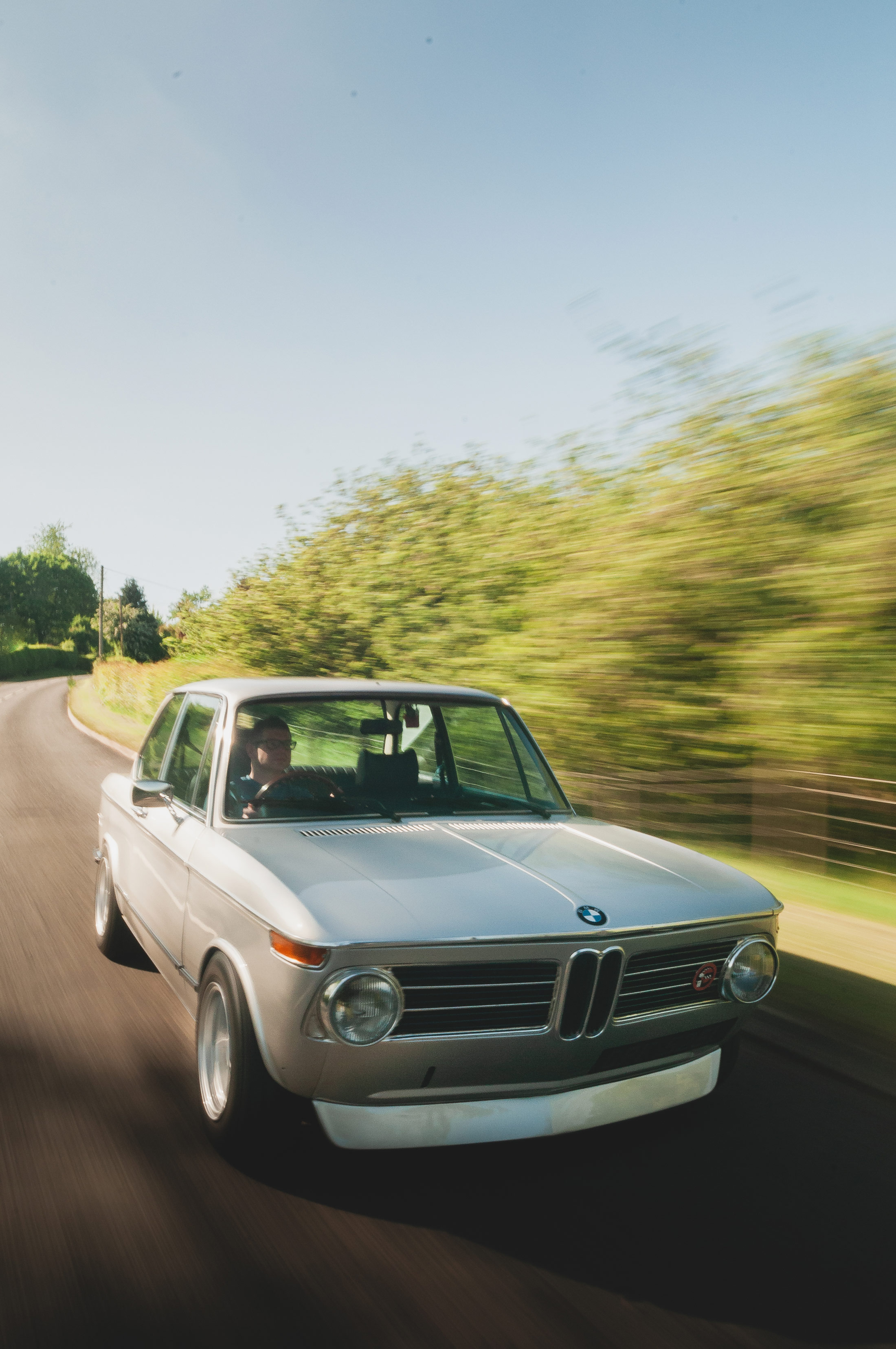 BMW Magazine shoot of a 2002 BMW at speed.