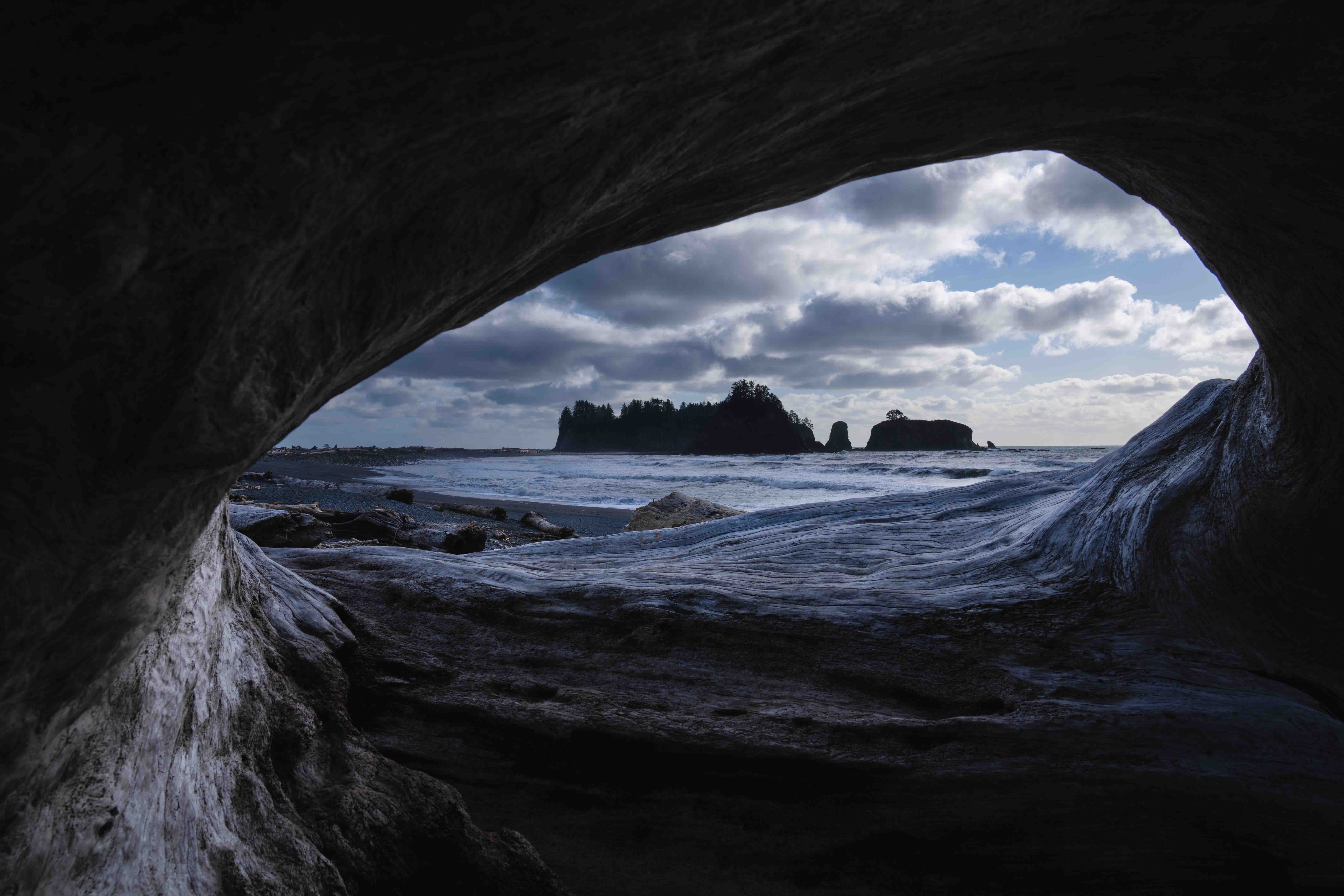 Photo of Rialto Beach from a cave in Olympic National Park in Washington State