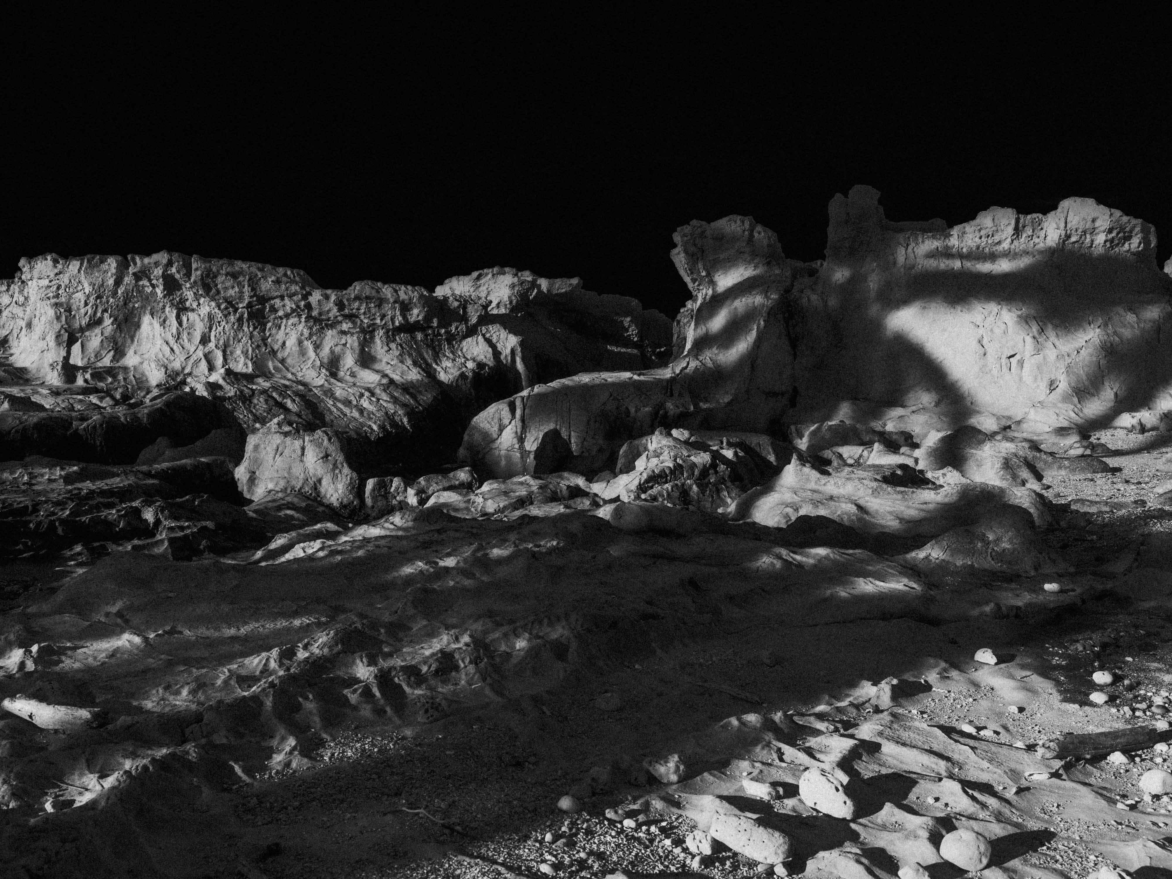 Rock formation in black and white. Moonscape. Night. shot by Ian Howorth with a Hasselblad X1D II medium format camera
