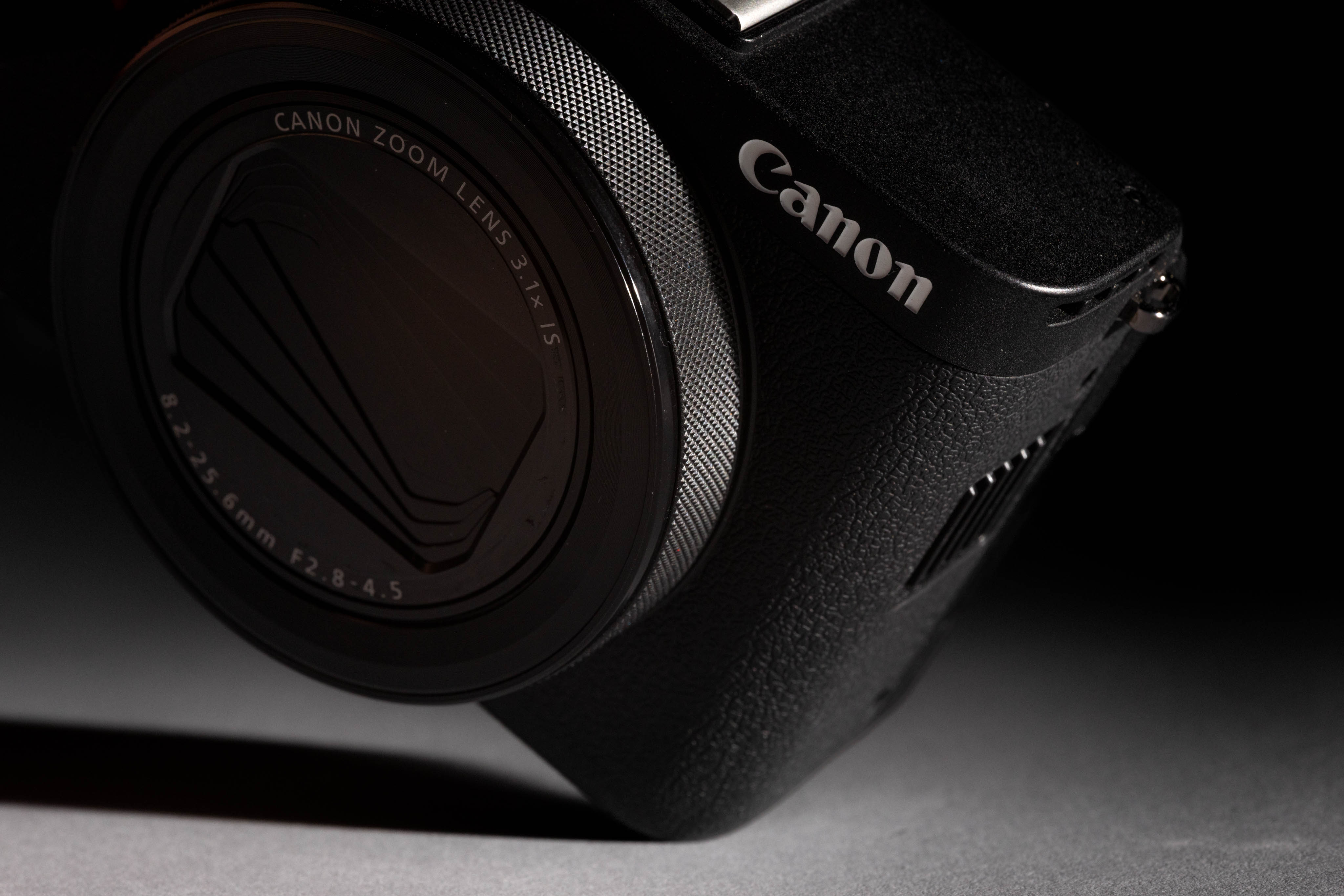 Closeup image showing the Canon logo on a used Canon PowerShot V1 camera from MPB, image by Connor Redmond.