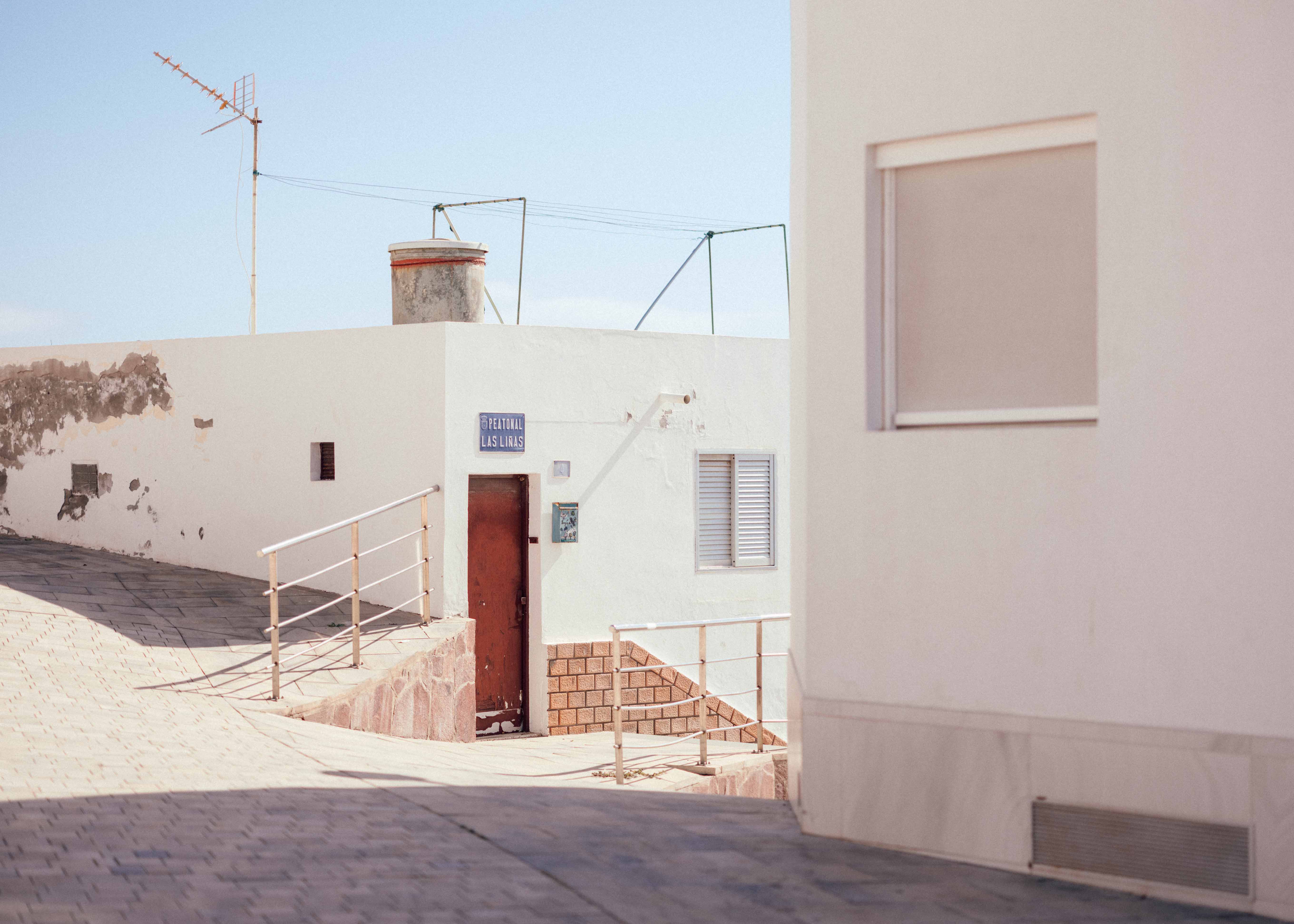 
An image of a street corner in Morro Jable, Fuerteventura. Taken on the Fujifilm GFX 50R by Connor Redmond. 

