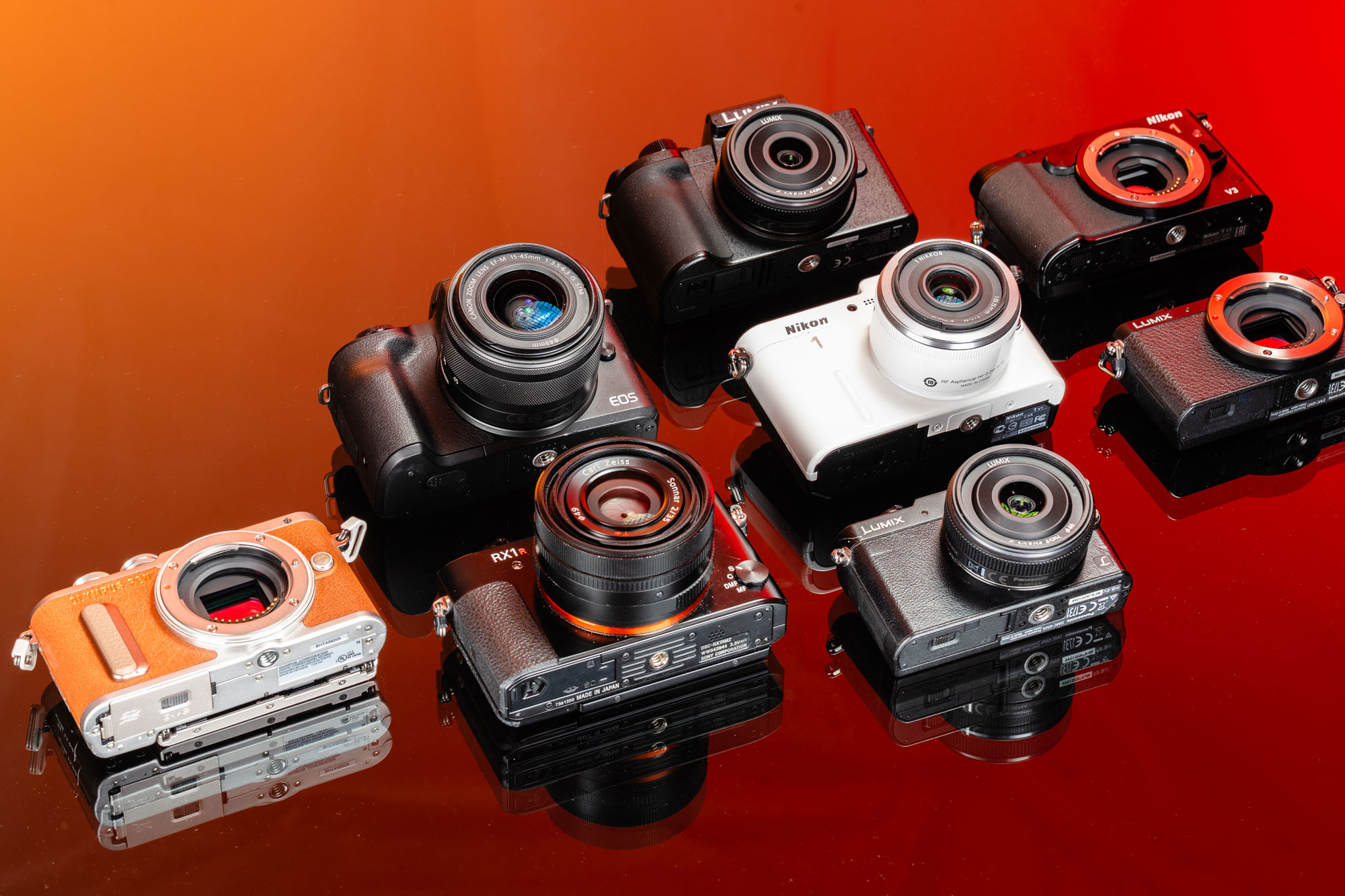 Left to right: Used Olympus PEN E-PL8 | Canon EOS M50 Mark II | Sony RX1R II | Panasonic G100 | Nikon 1 V1 | Panasonic GM5 | Nikon 1 V3 | Panasonic GM1