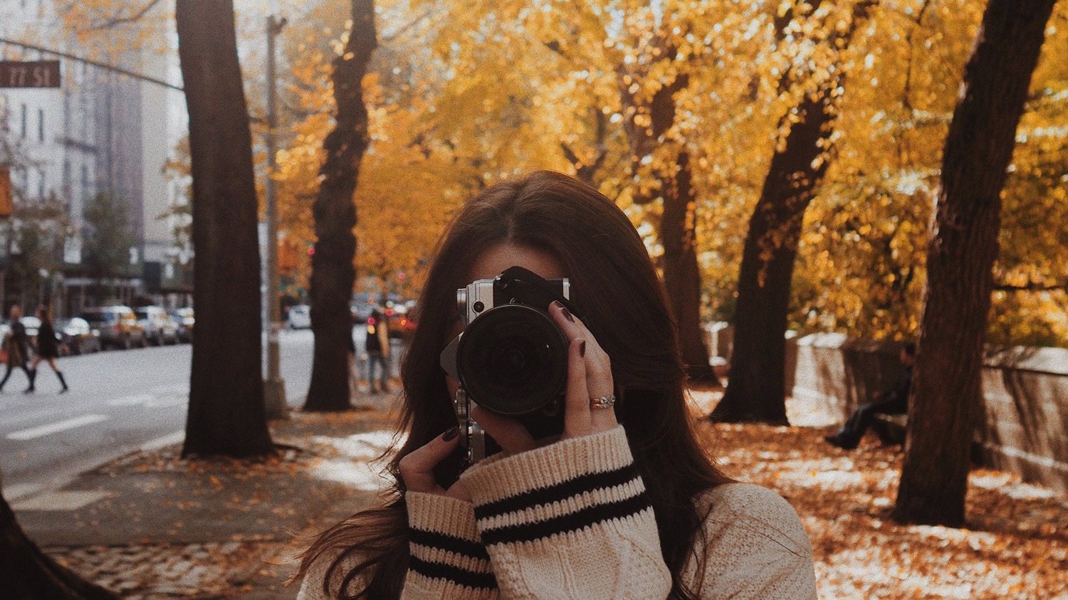 Georgina Lamrock taking a photo with the Olympus E-M5 III  in Central Park
