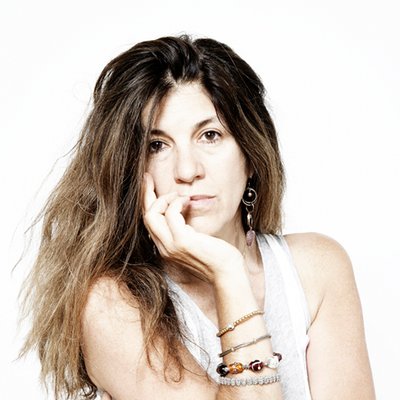 A portrait photo of Jillian Edelstein wearing a white top