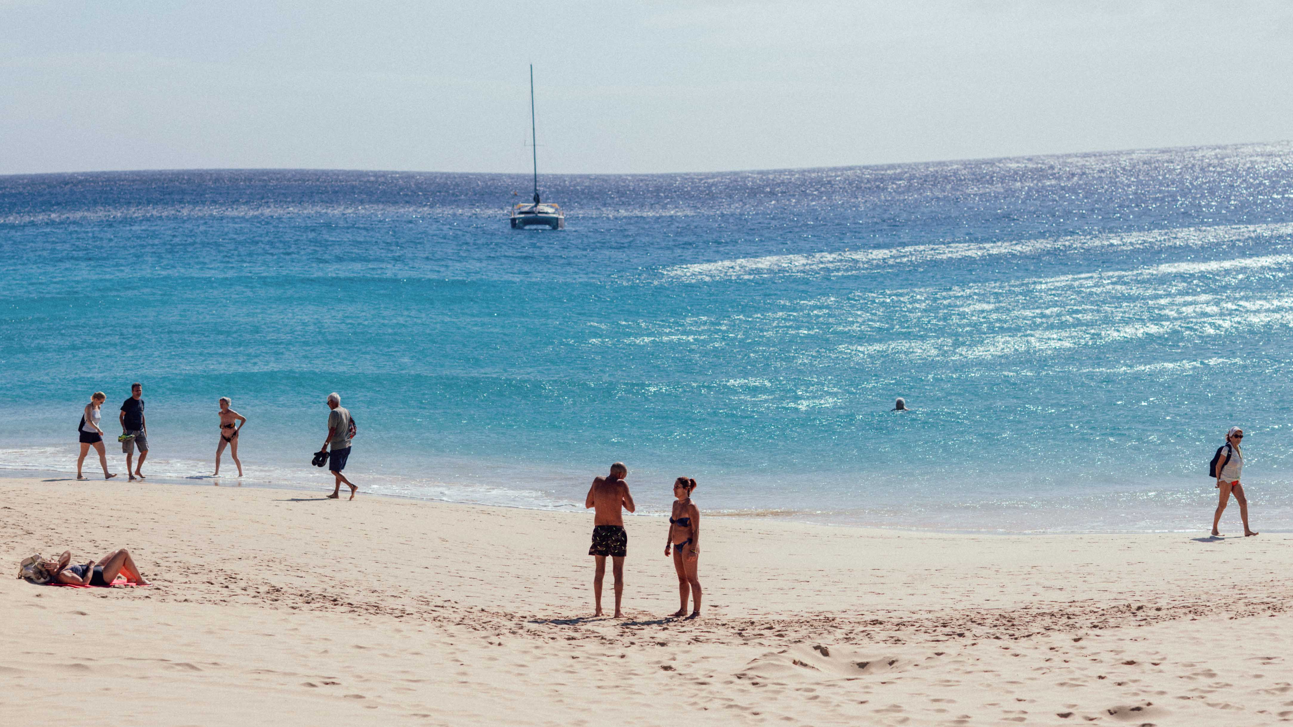
An example image of bad electronic rolling shutter showing sea waves on the beach distorted. 

