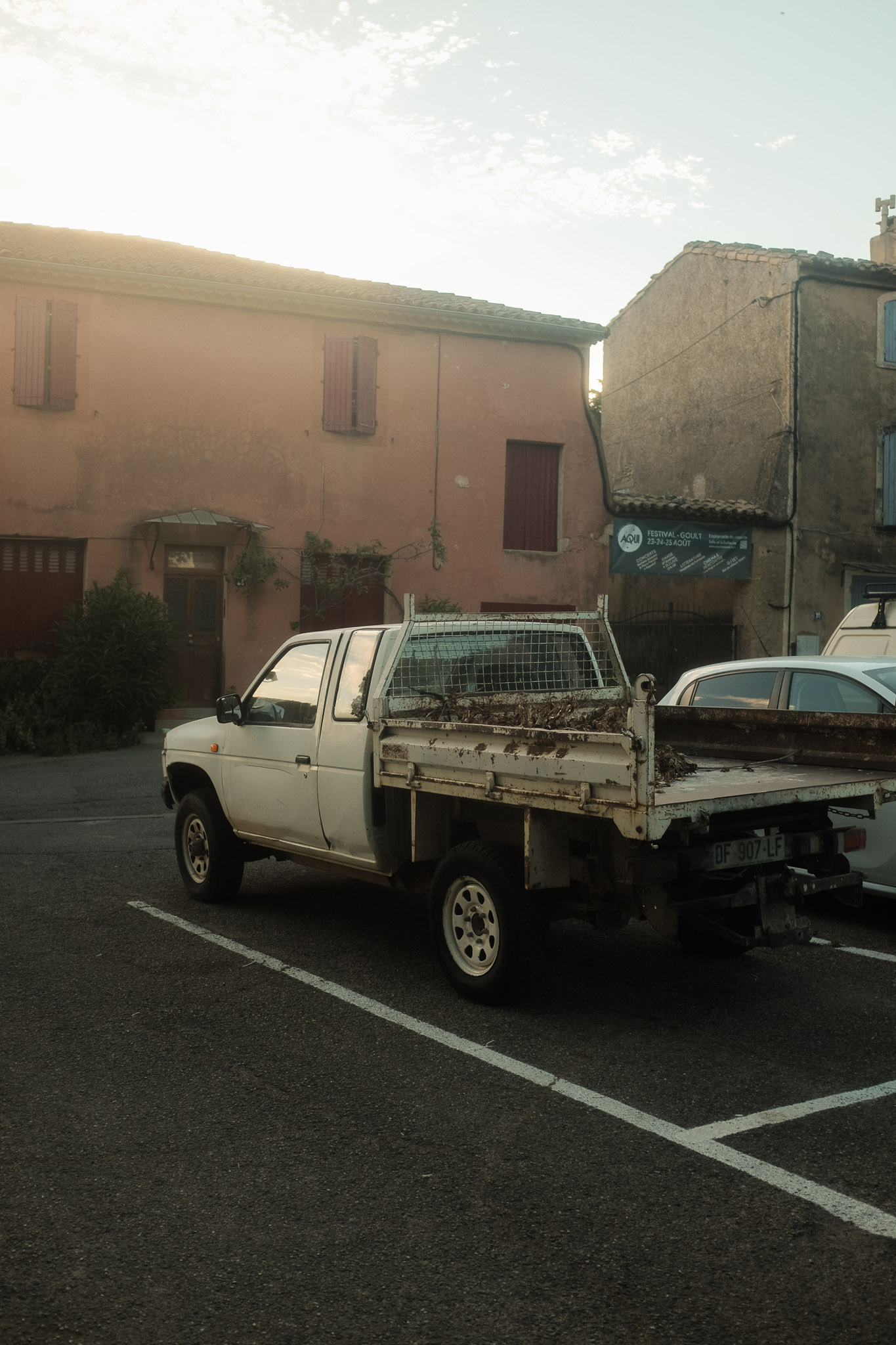 An old truck parked up in a quaint french village at dusk. Taken on the Fujifilm X100T by Connor Redmond.