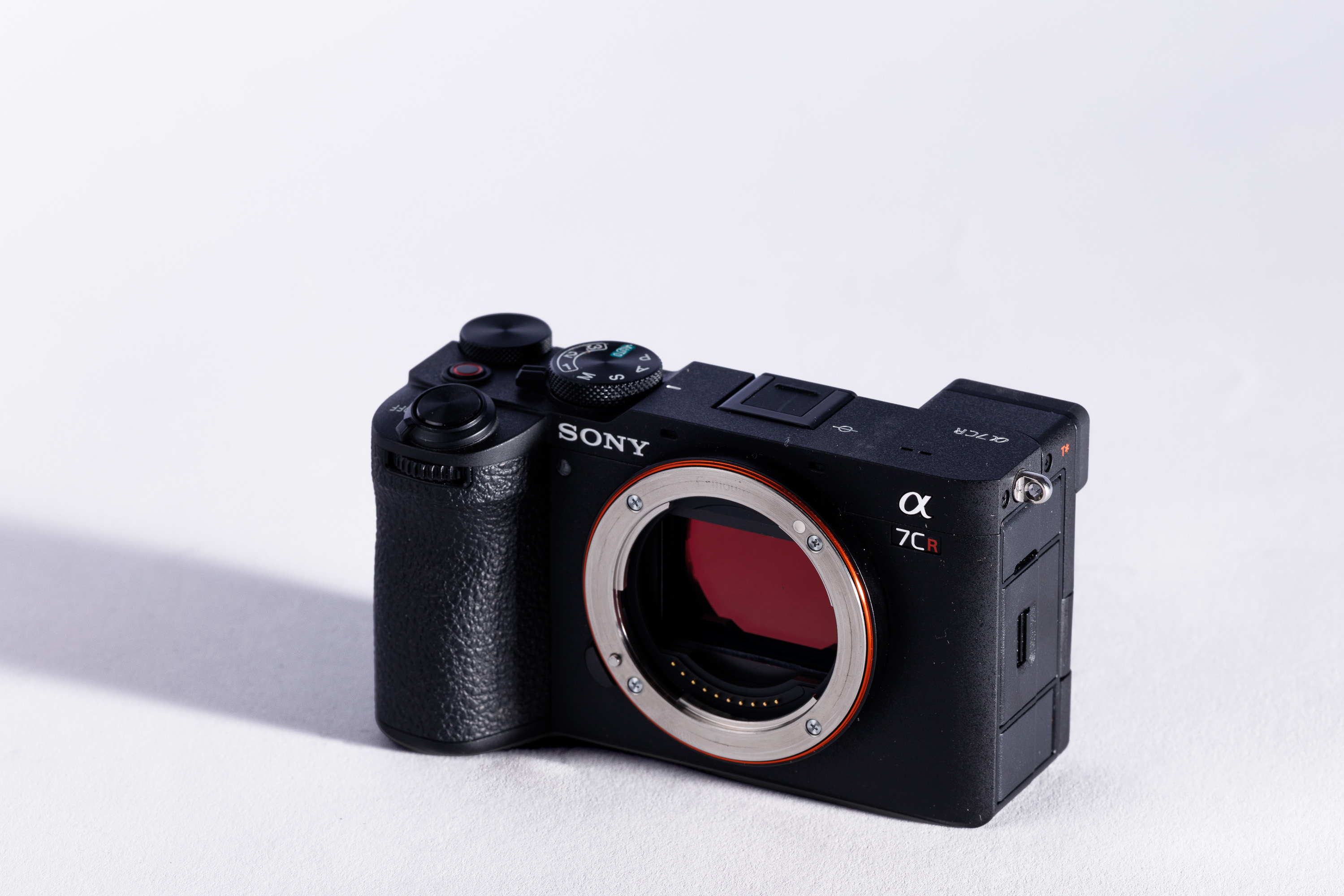 A Sony A7CR body on a white background, with a shadow to the left.