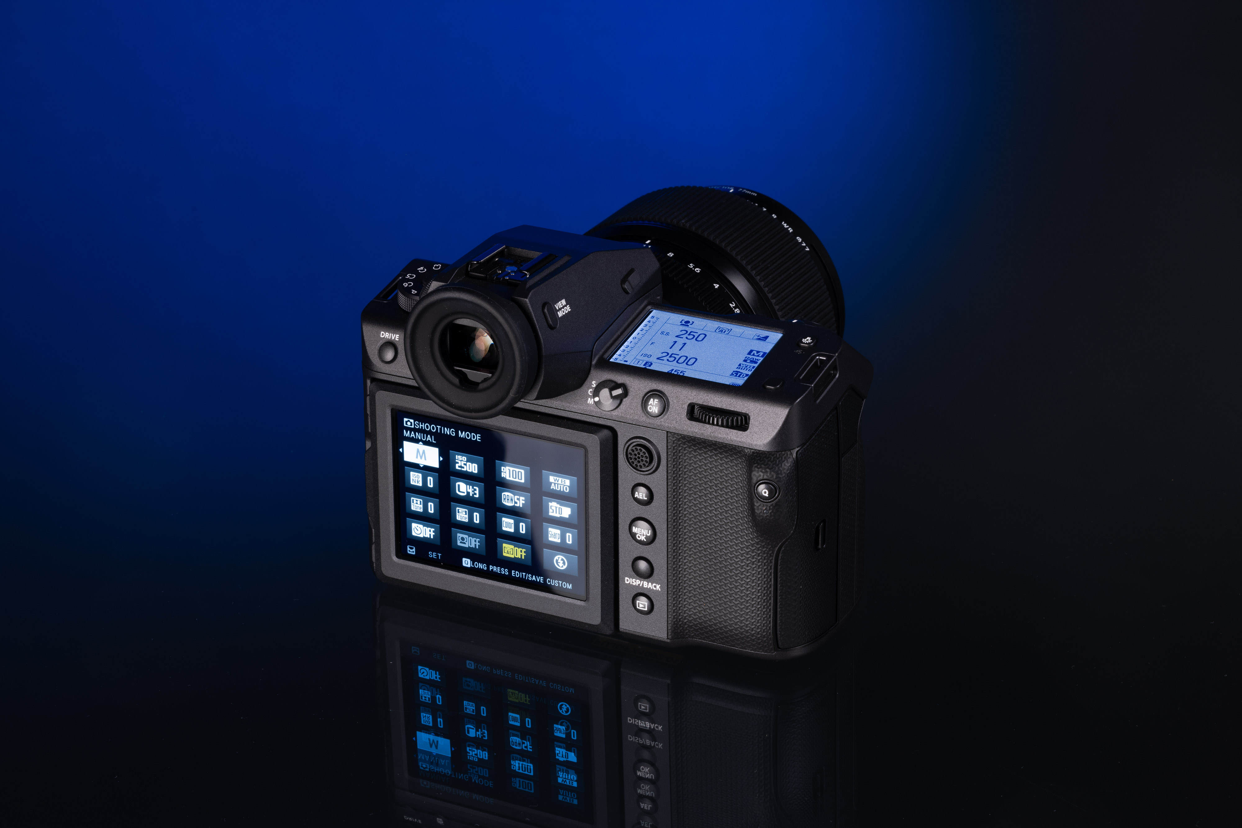 Back of the Fujifilm GFX 100 II on a blue and black background