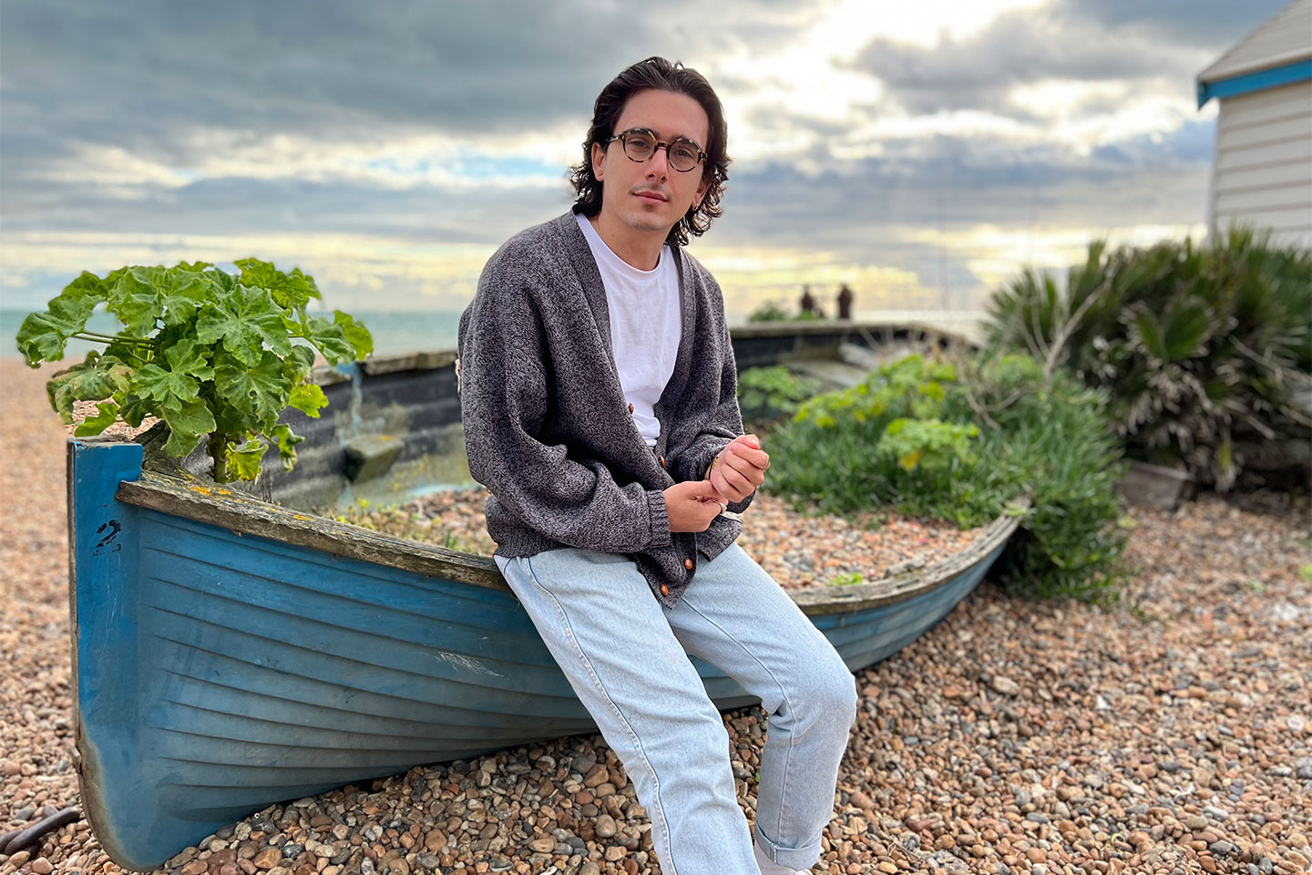 Portrait of a person sitting on a boat, taken with an iPhone 13 Pro