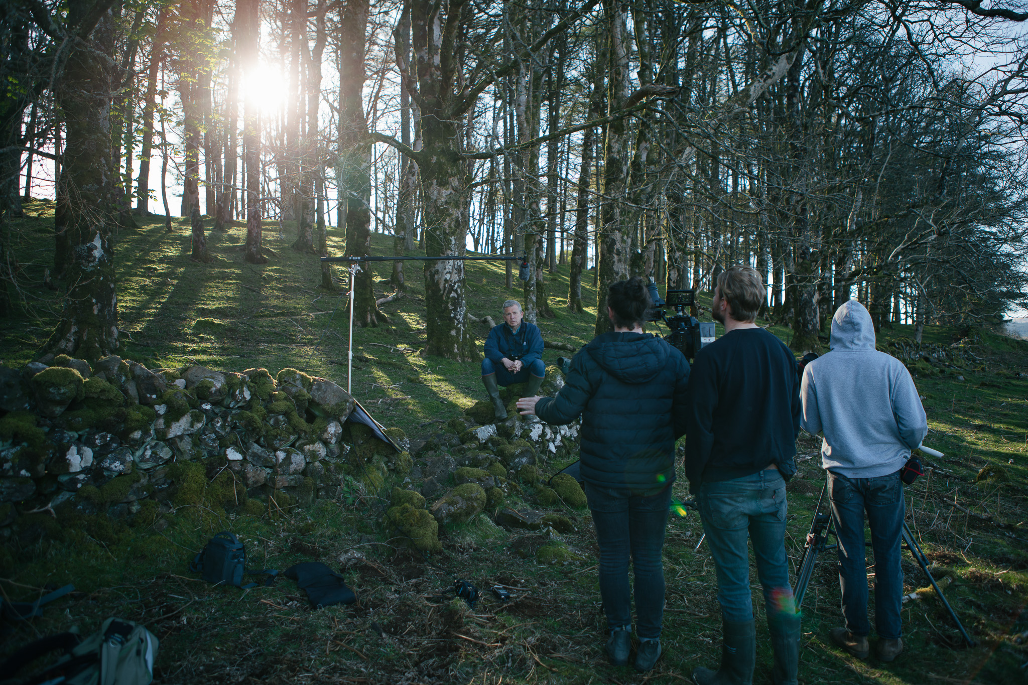 Behind the scenes of an interview in the woods
