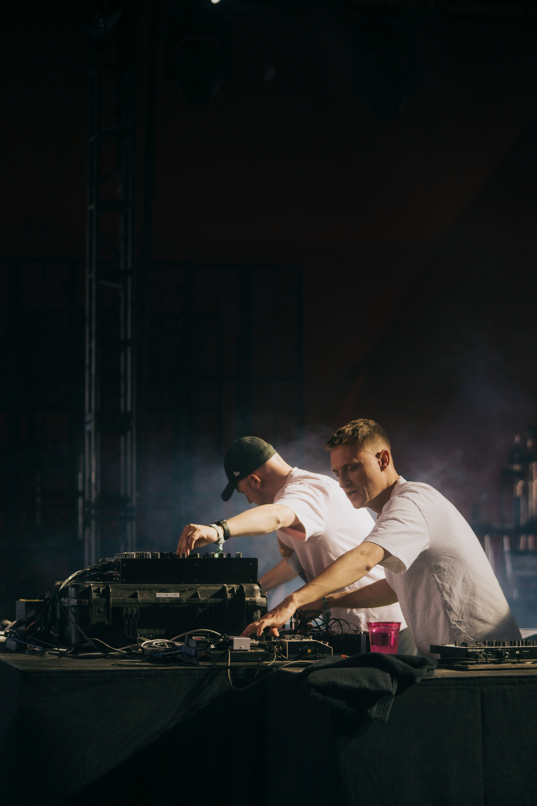 Photograph of music duo Overmono on stage during their Coachella Music Festival 2023 performance.