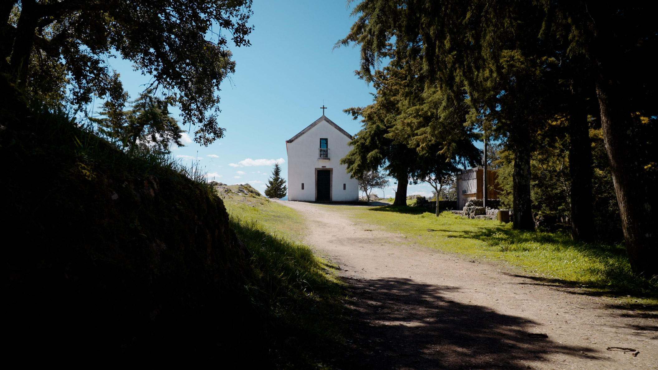 White church in countryside by Jakub Golis on a used Sony FX3 from MPB.