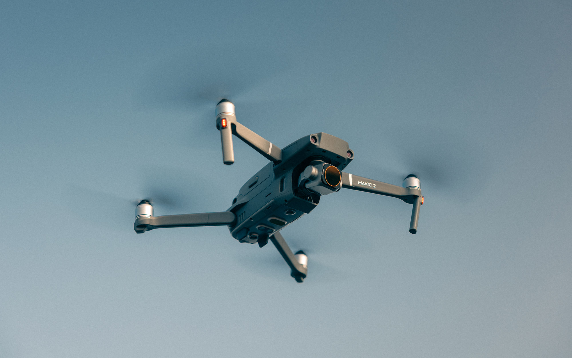 A flying DJI Mavic 2 Pro, shot with a Canon EOS R5 body and Canon RF 24-70mm f/2.8 L IS USM lens by travel photographer Harry Pope.