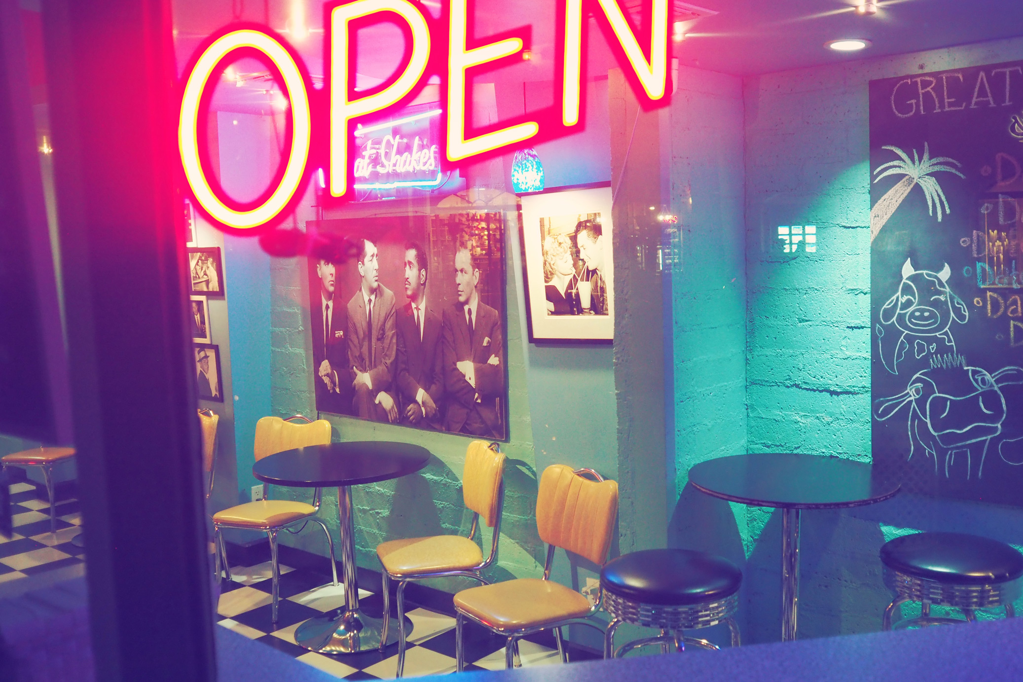Diner window at night in Palm Springs, California taken on an Olympus Pen-F by Justin Patricolo.