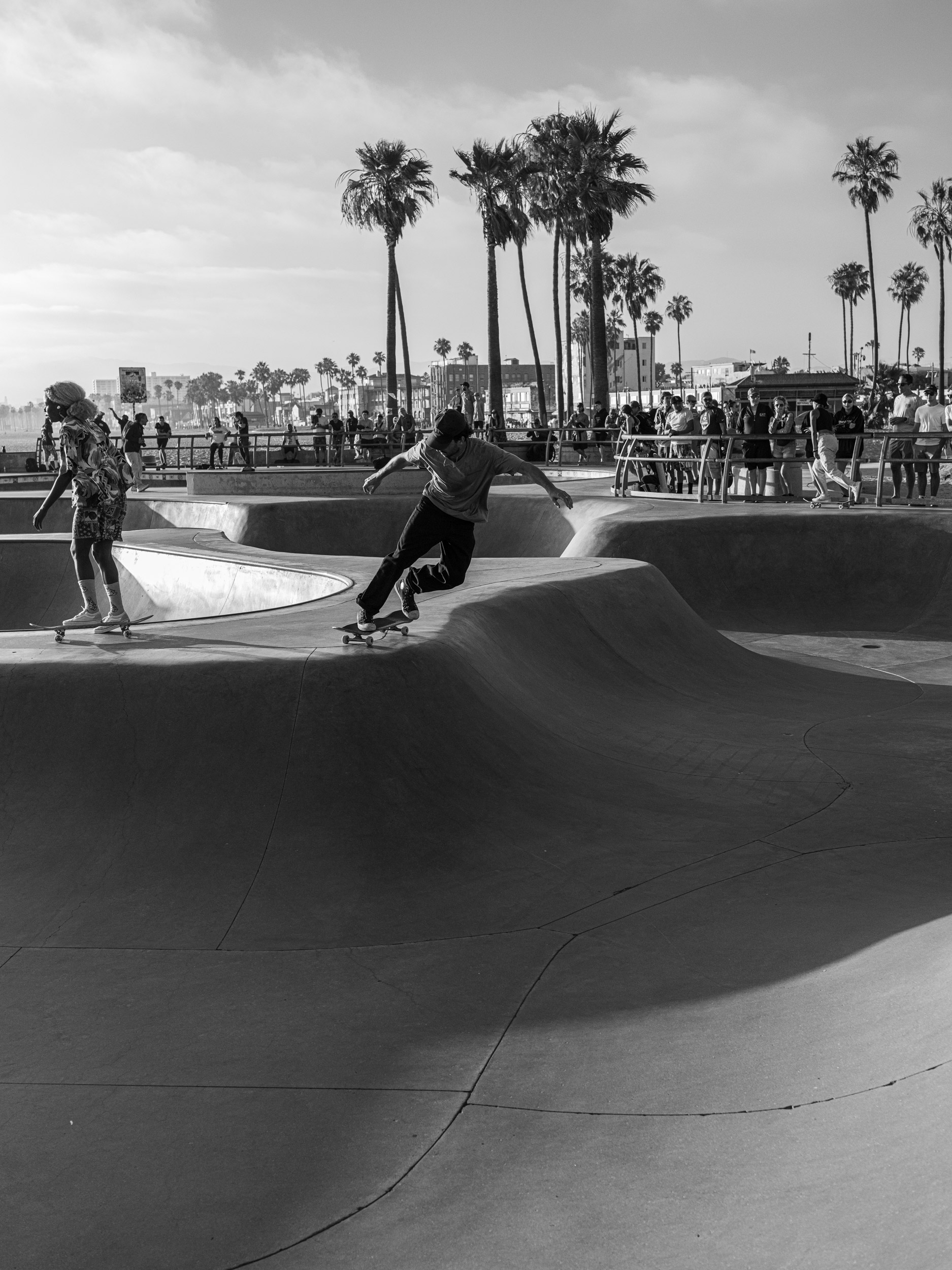 Skateboarder at Venice Beach in black and white.