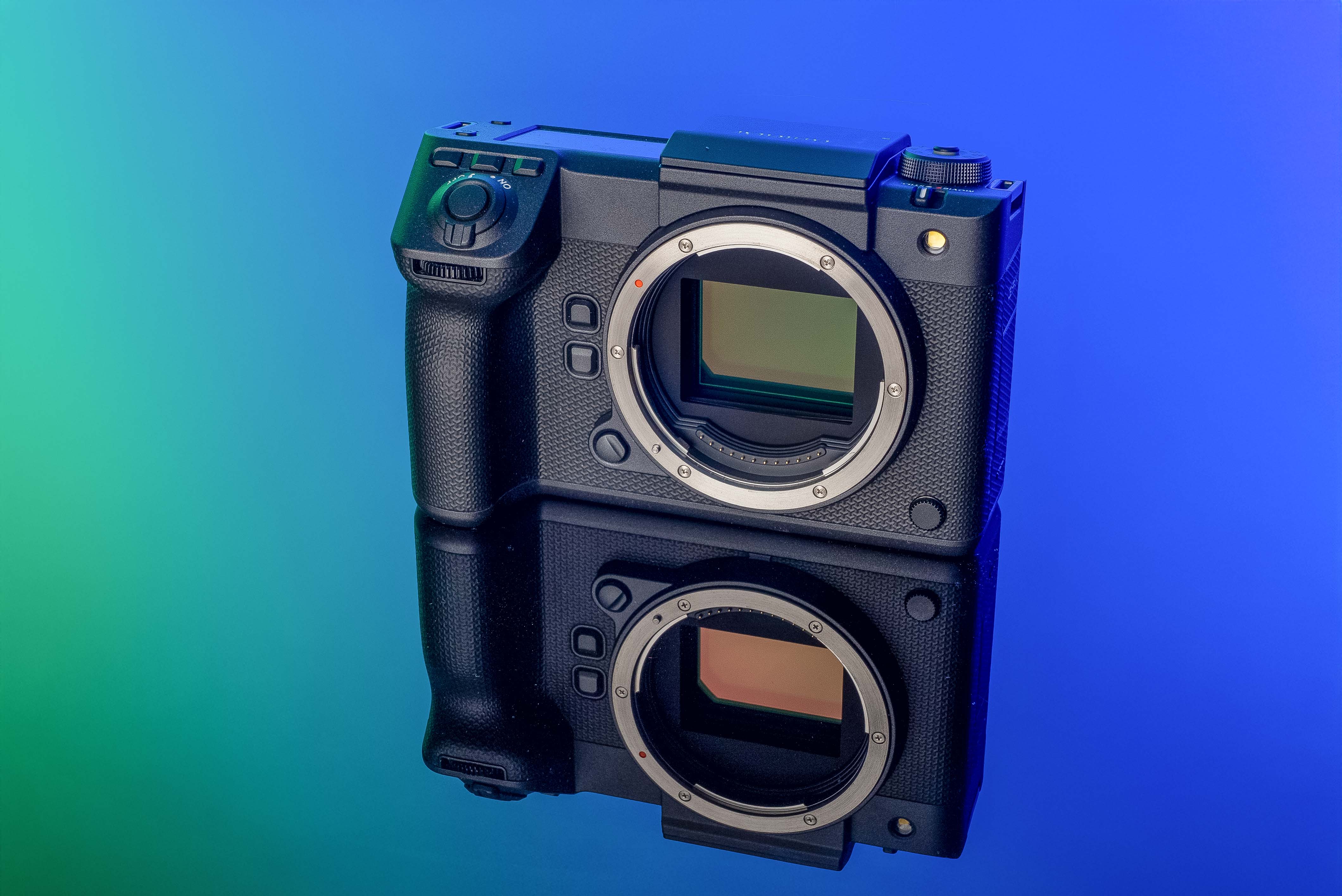 Fujifilm GFX 100 on a blue and light blue background
