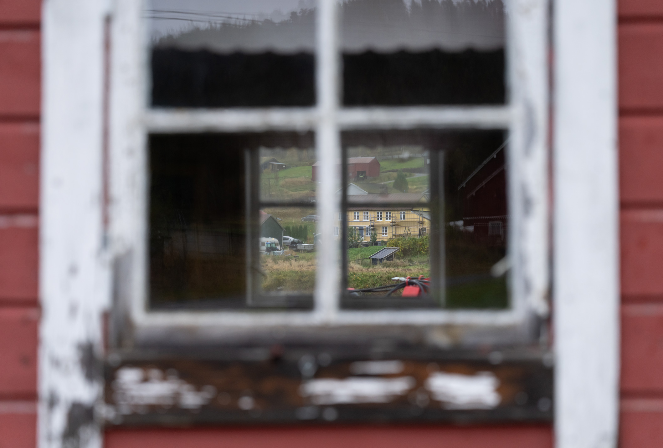 Shot of a building through a window in Norway