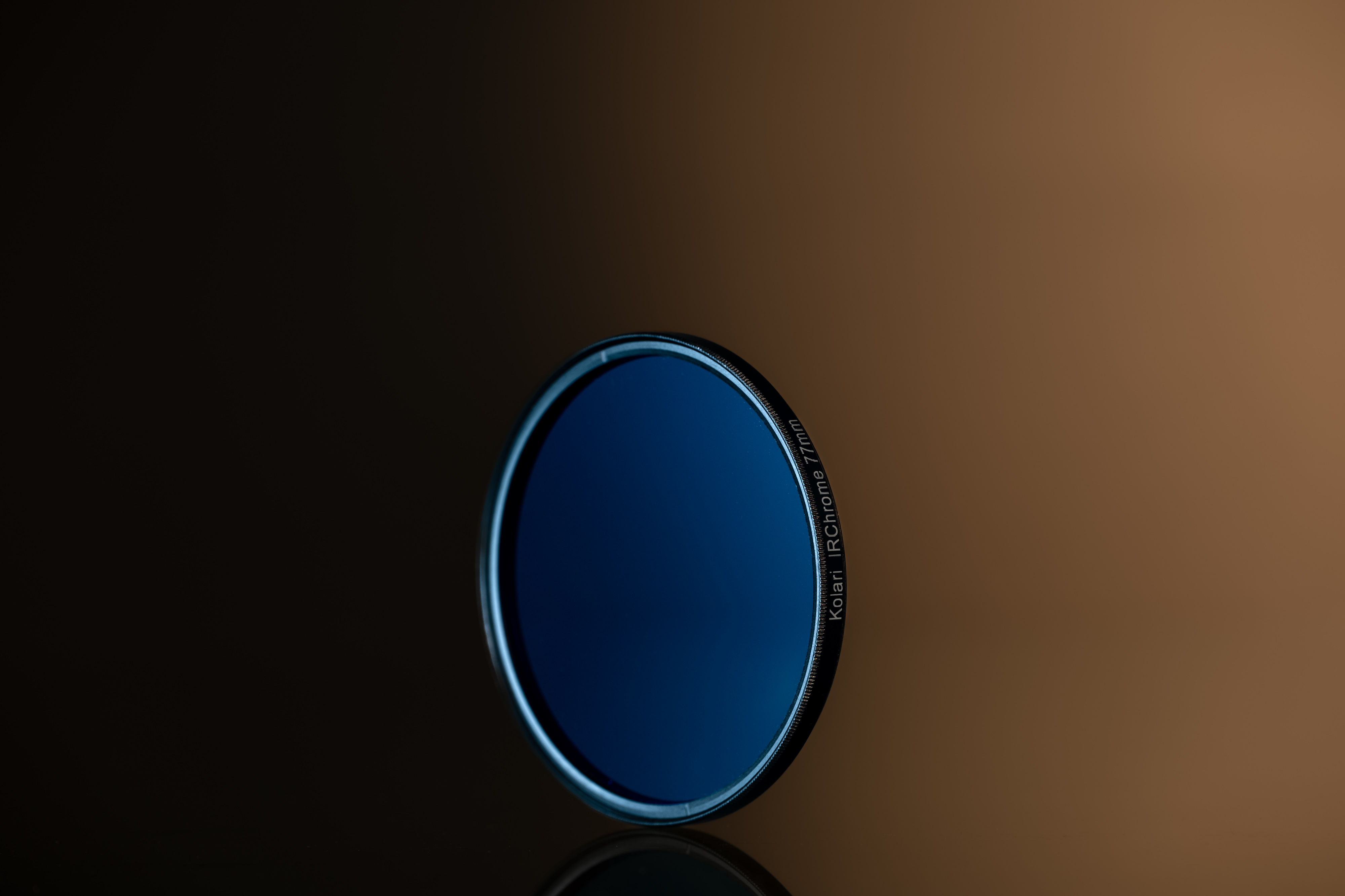 A Kolari IR Chrome filter on an orange and black background