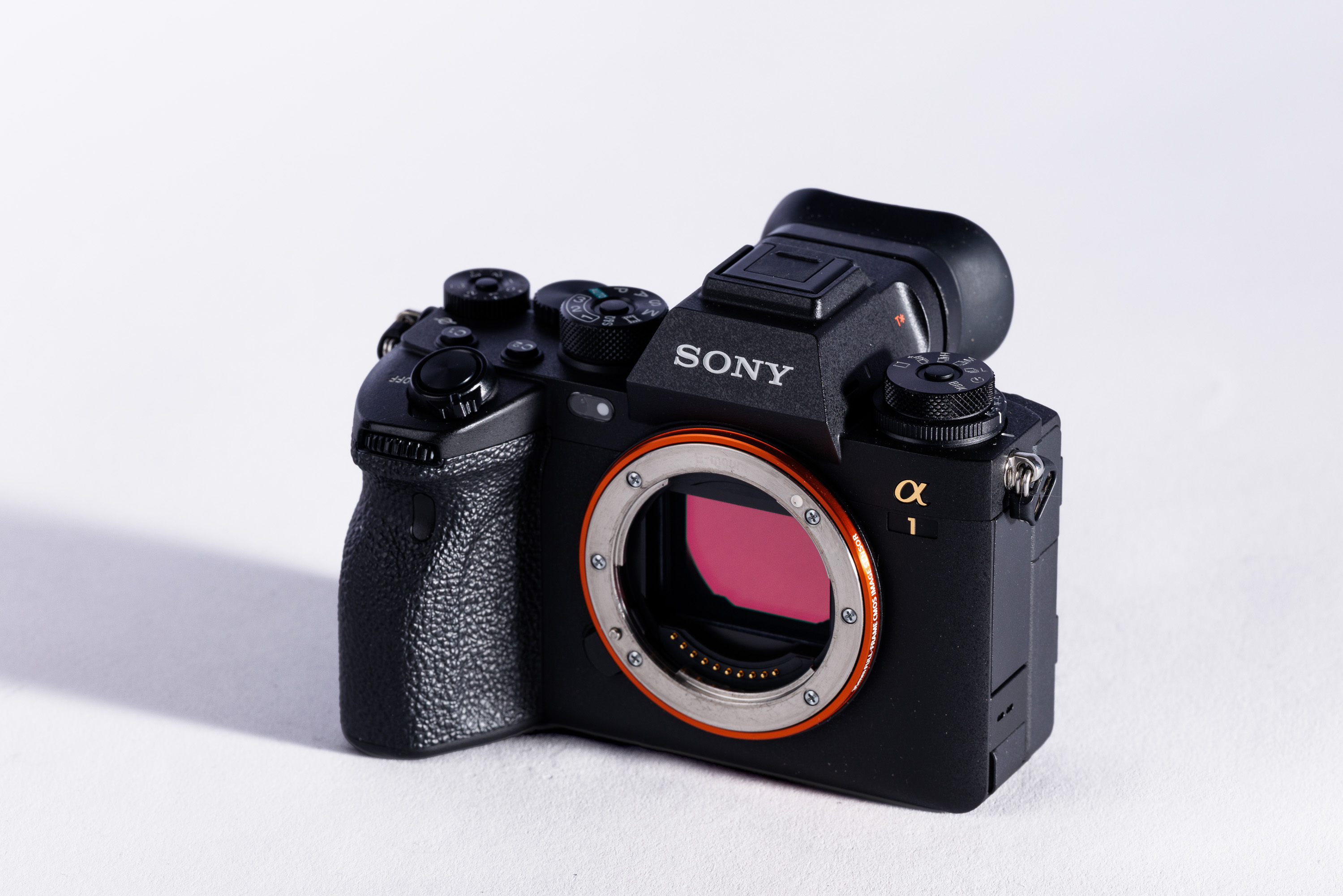 A used Sony A1 body on a white background, with a shadow to the left.