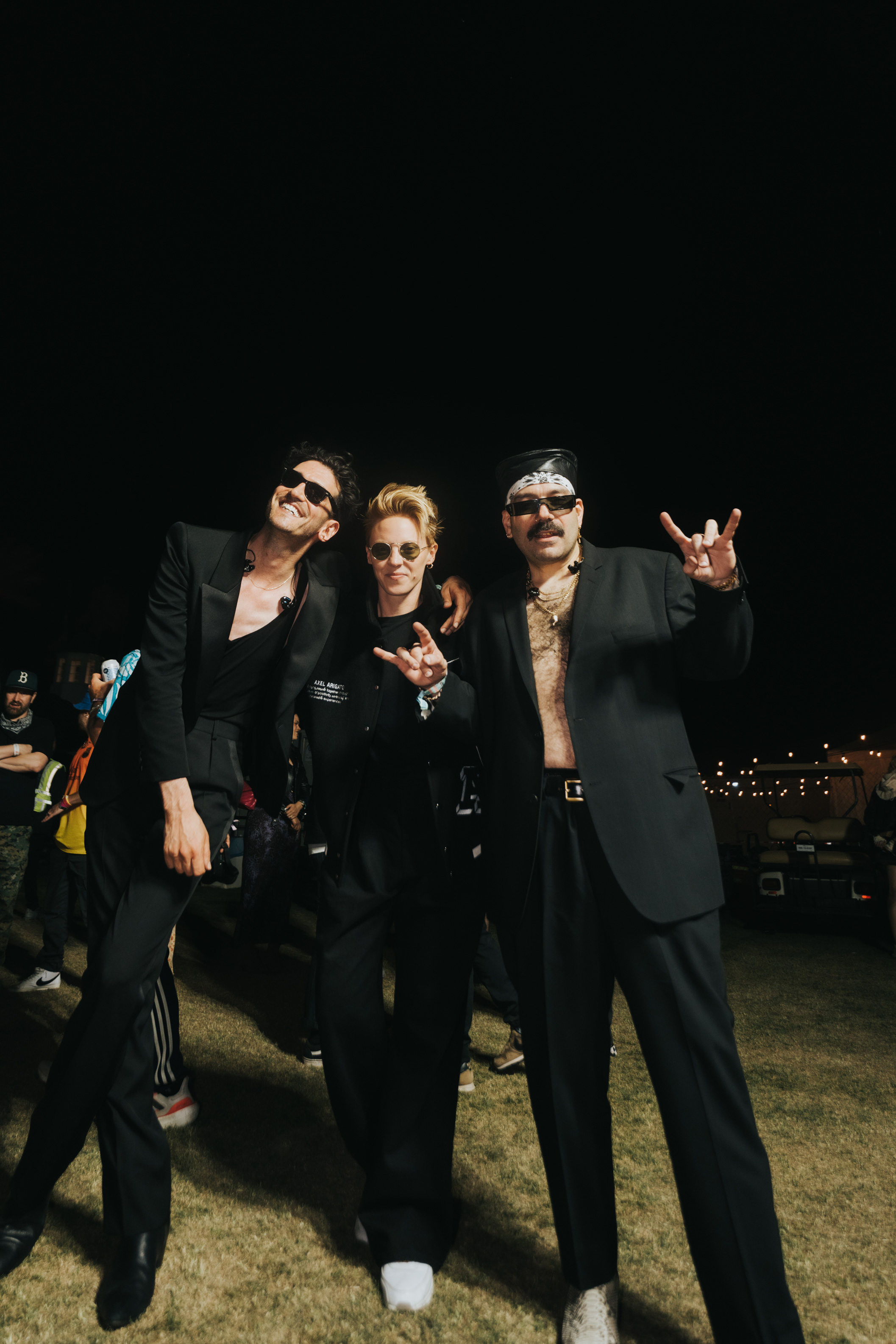 Group portrait of musical group Chromeo backstage at Coachella Music Festival 2023.
